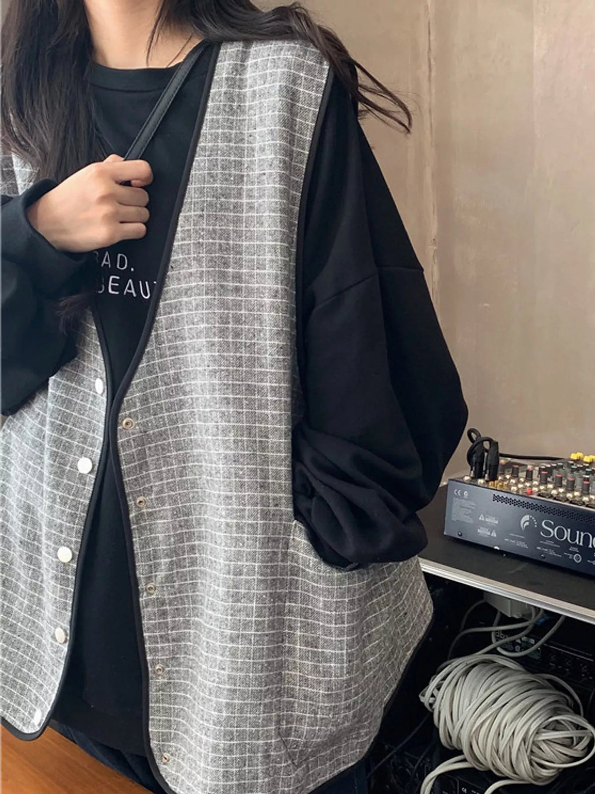 Letter-print sweatshirt, black layered outfit
