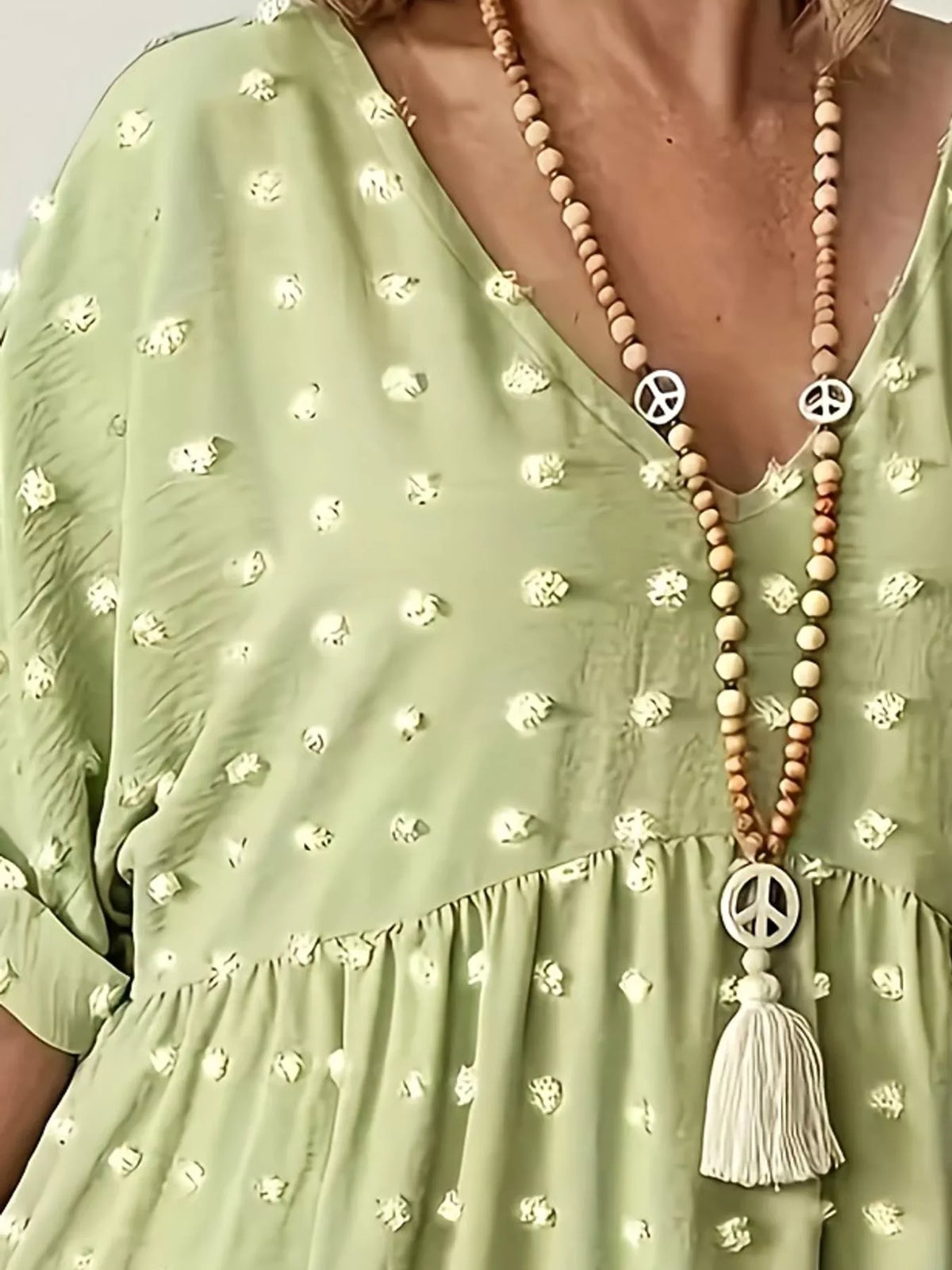 Swiss-dot blouse, light green neckline detail