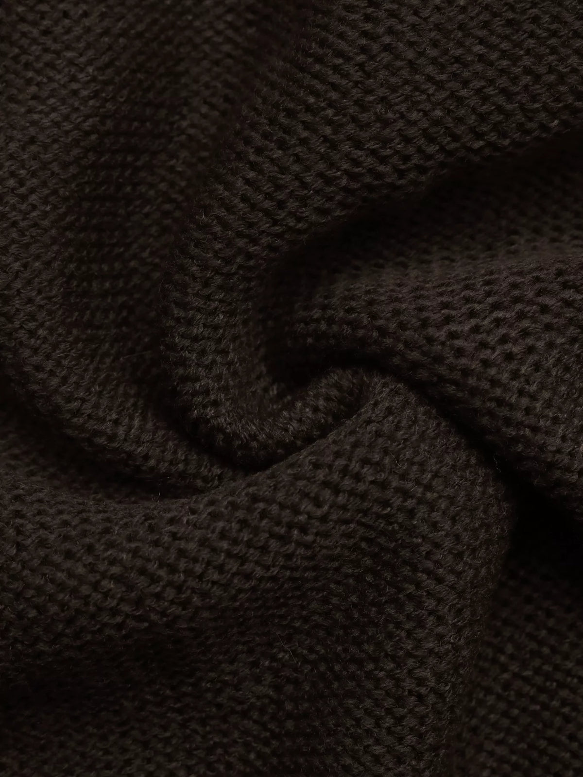 Brown V-neck cable knit cardigan, knit fabric close-up
