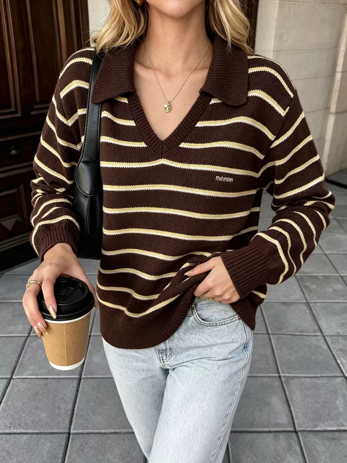 Brown and cream striped polo-collar sweater, front detail.