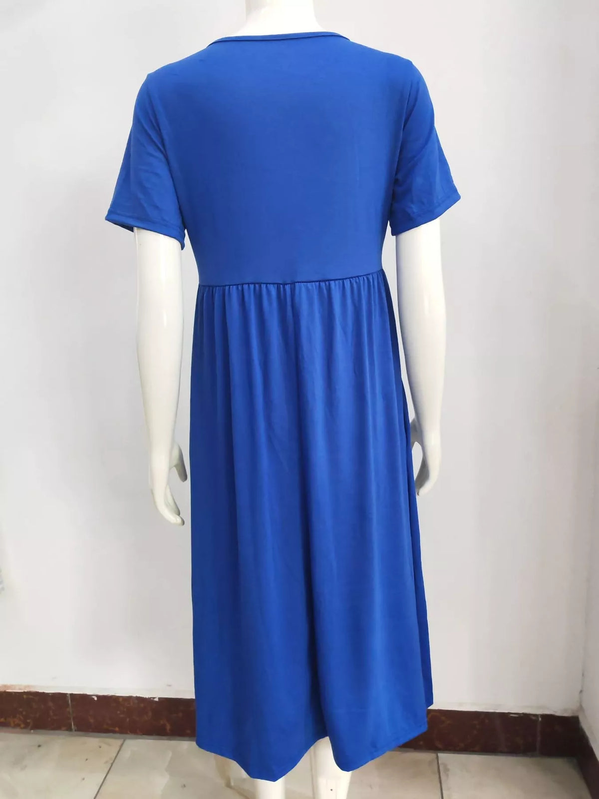 Blue crisscross short sleeve midi dress, back view