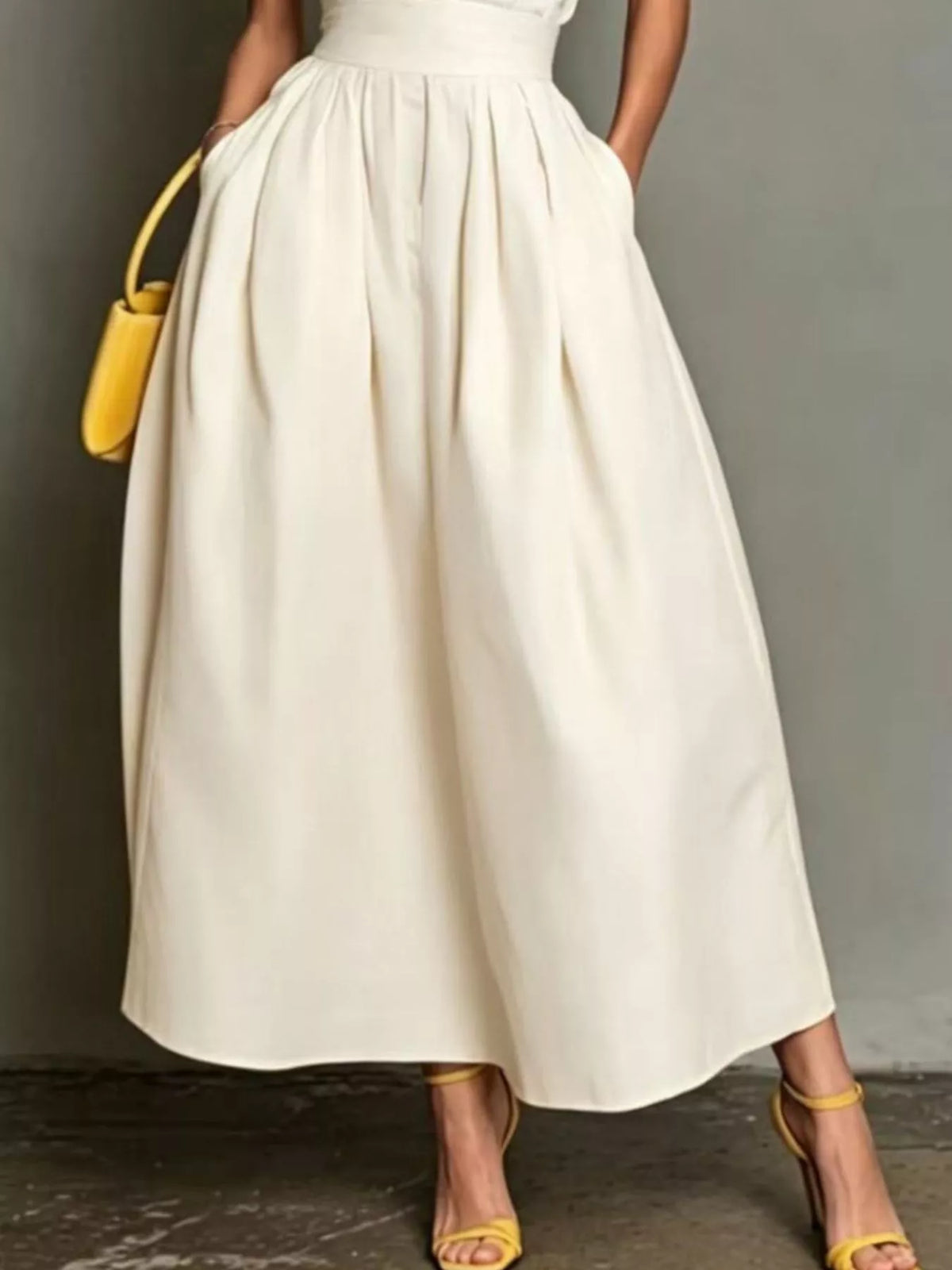 Cream halter-collar A-line midi dress, skirt detail