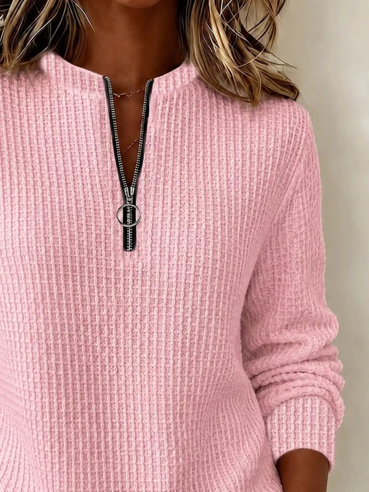 Pink quarter-zip textured sweatshirt, half-zip neckline and textured fabric