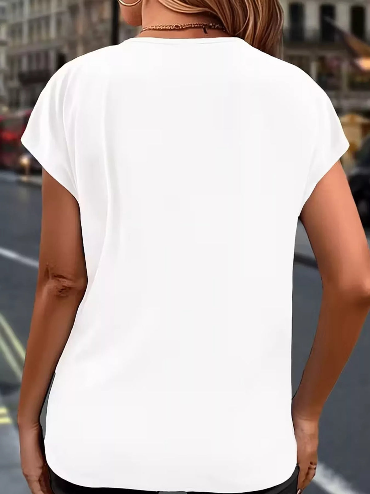White v-neck ruffle trim button-down shirt, back view