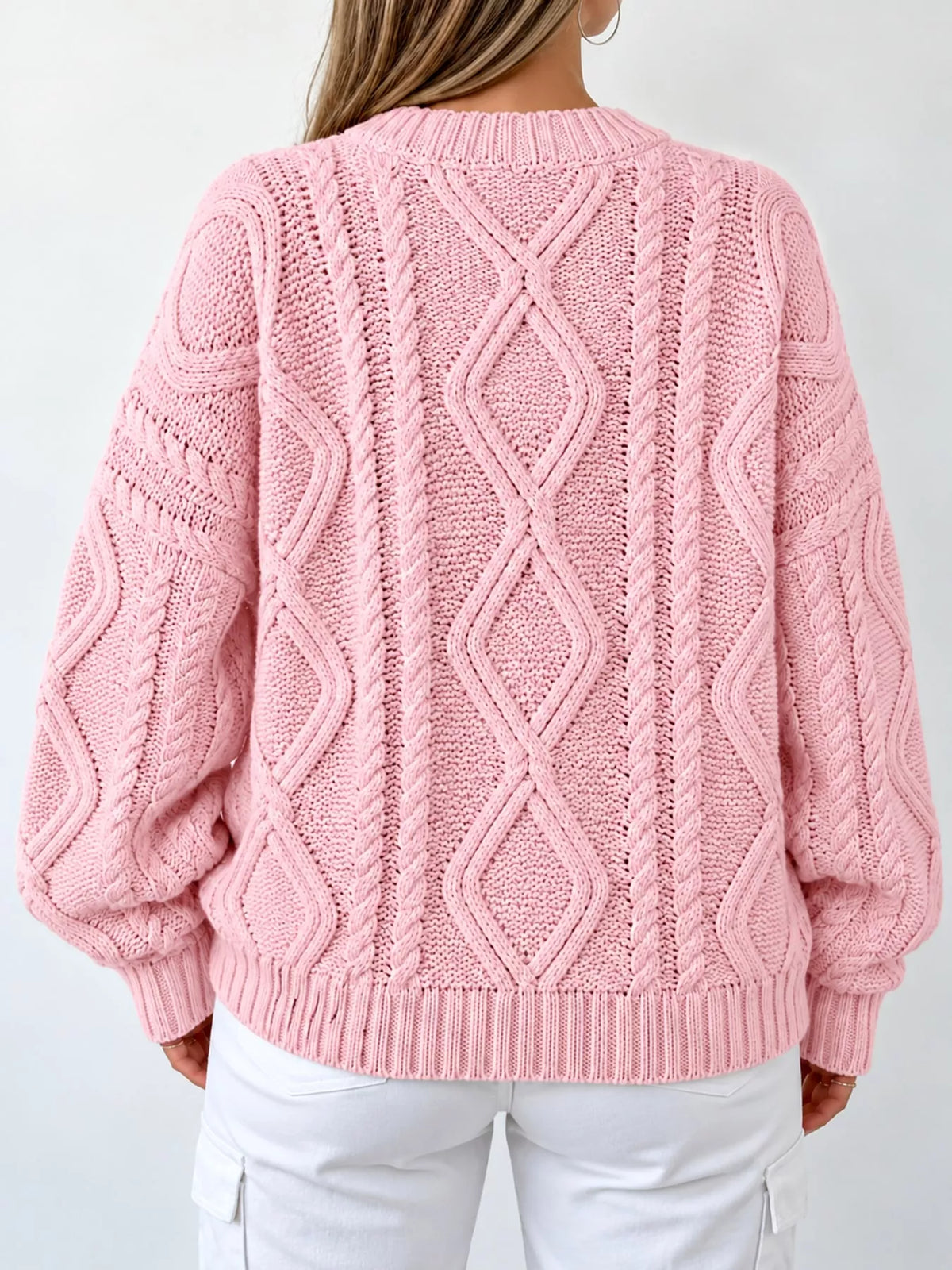 Pink cable-knit round neck sweater, back view