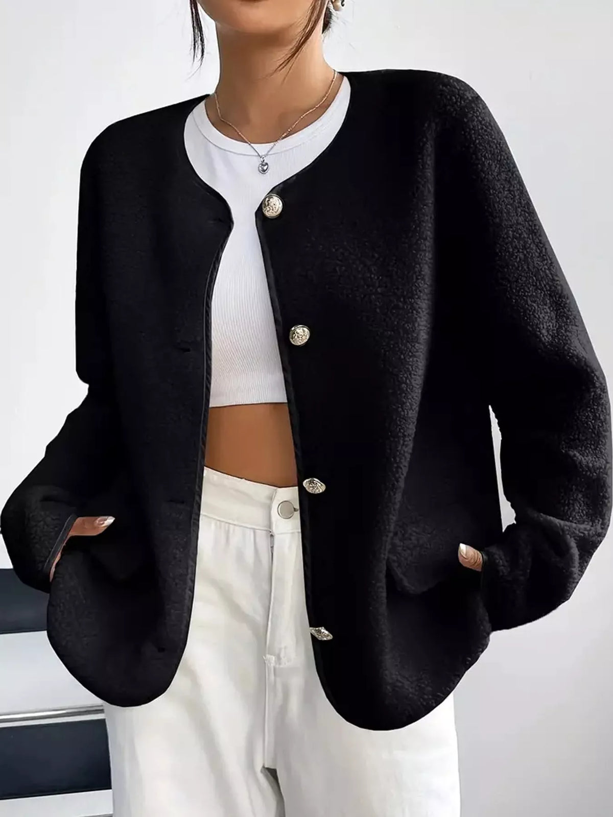 Black textured button-front jacket — front view
