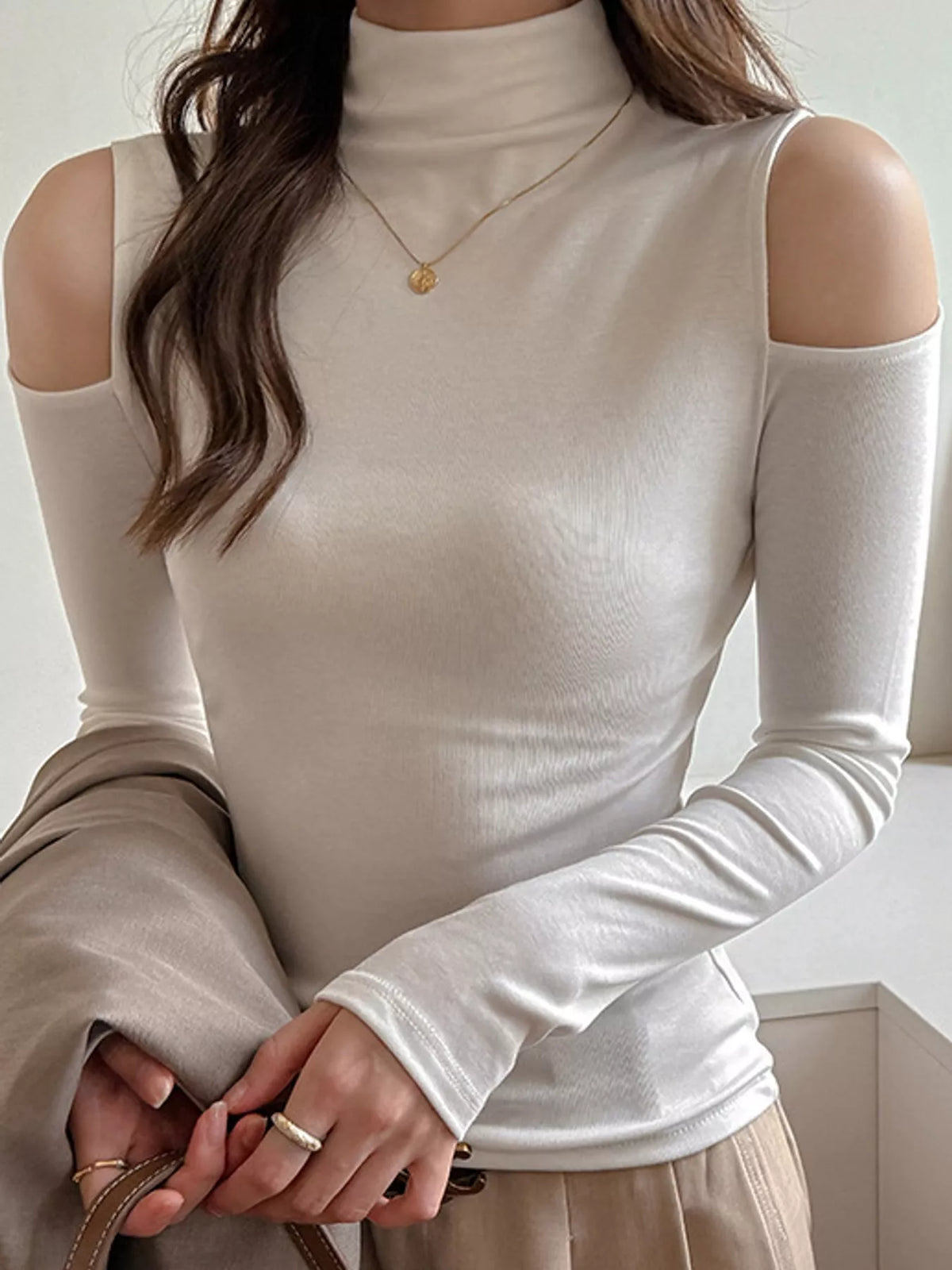 White mock neck cold-shoulder t-shirt, mock neckline and cold-shoulder openings