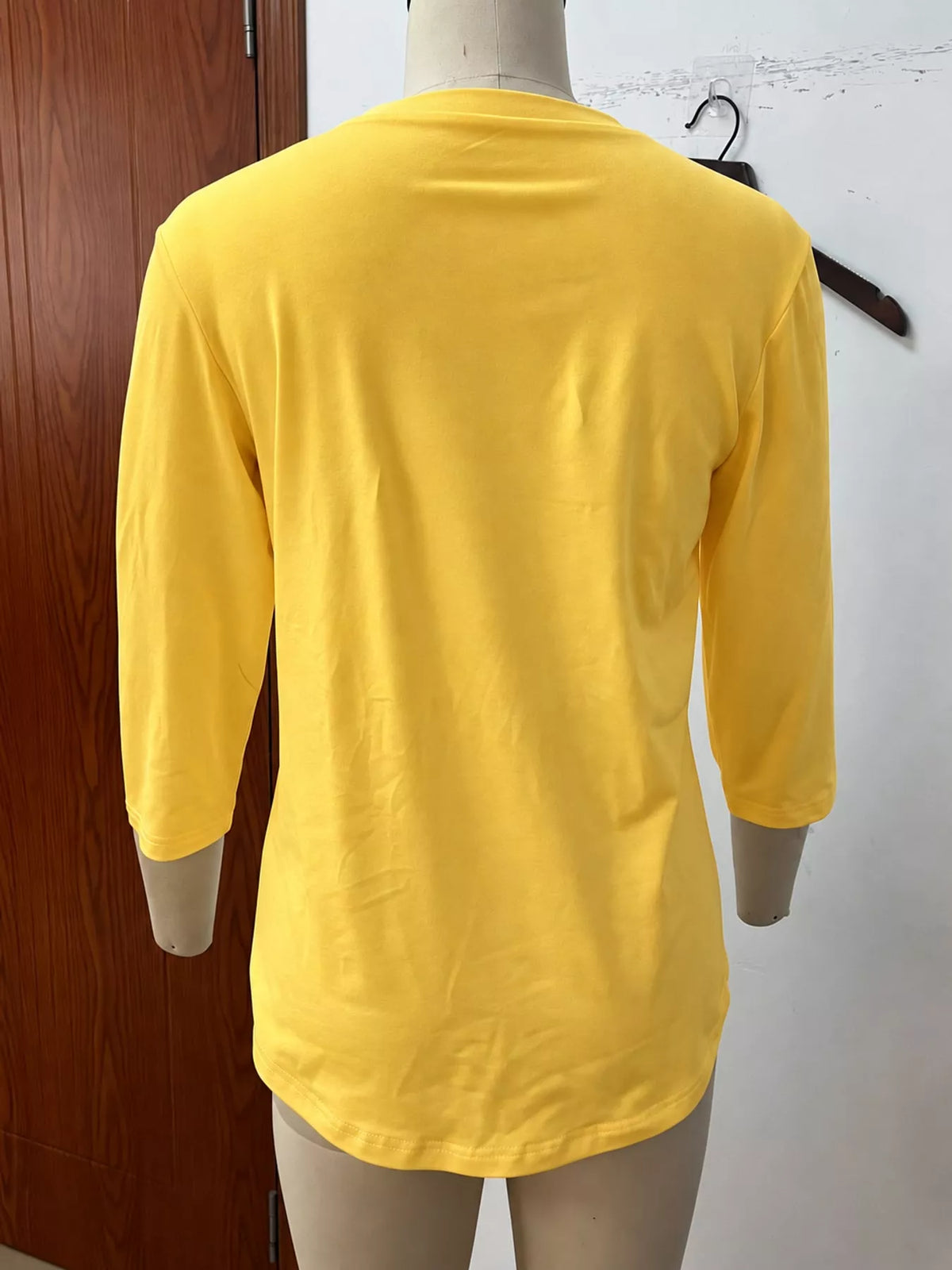 Yellow v-neck half sleeve t-shirt, back view