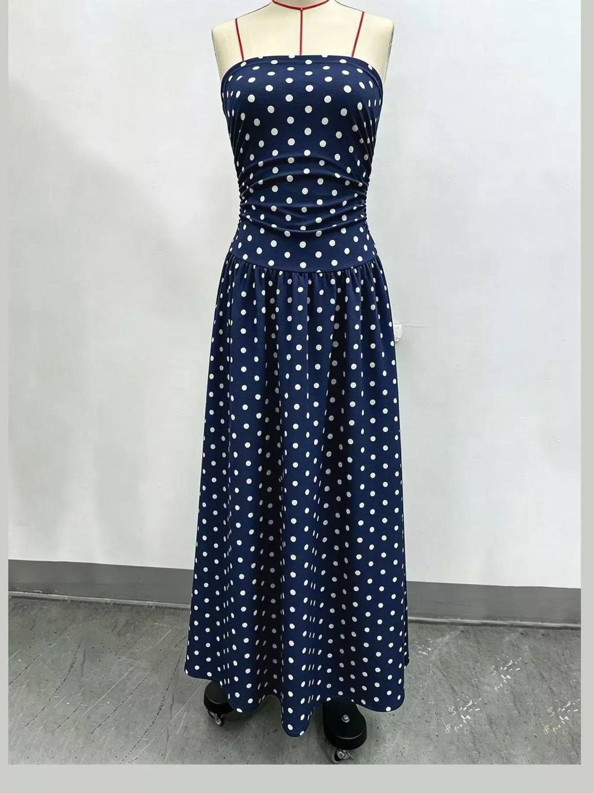 Women's Strapless Polka Dot Ruched Maxi Dress in navy dots — mannequin front view