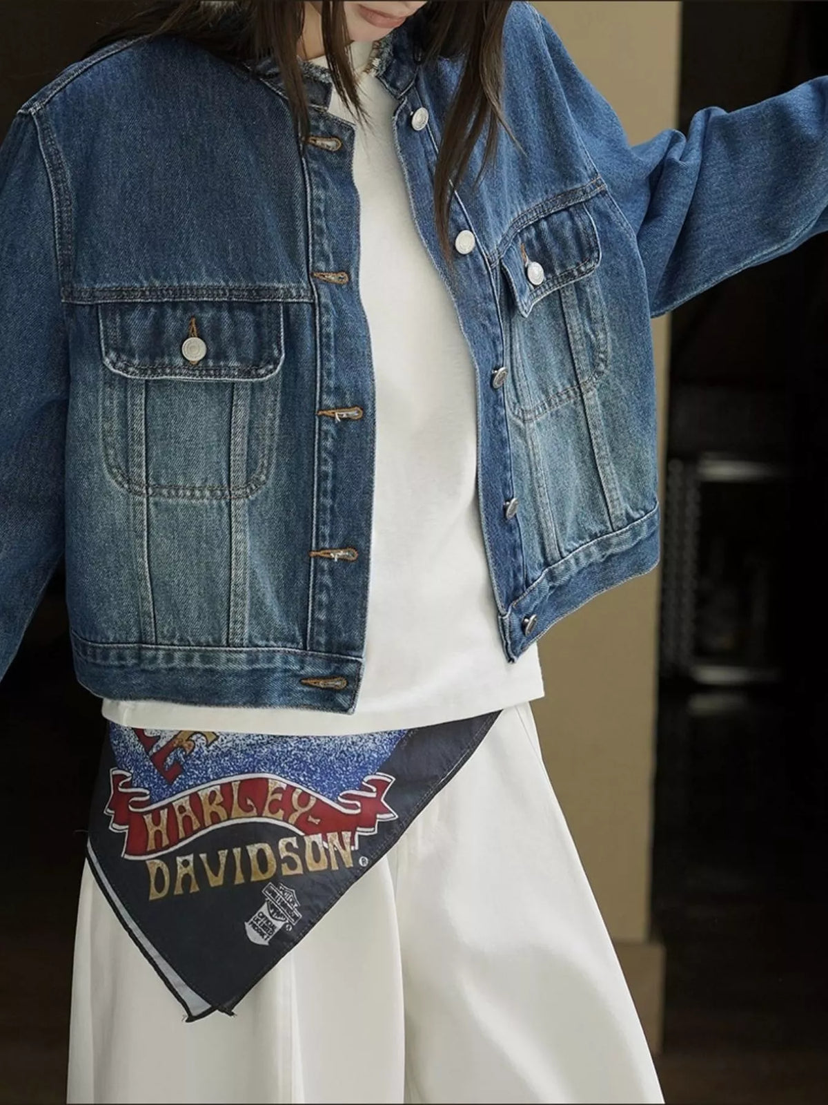 Blue button-up cropped denim jacket — front view