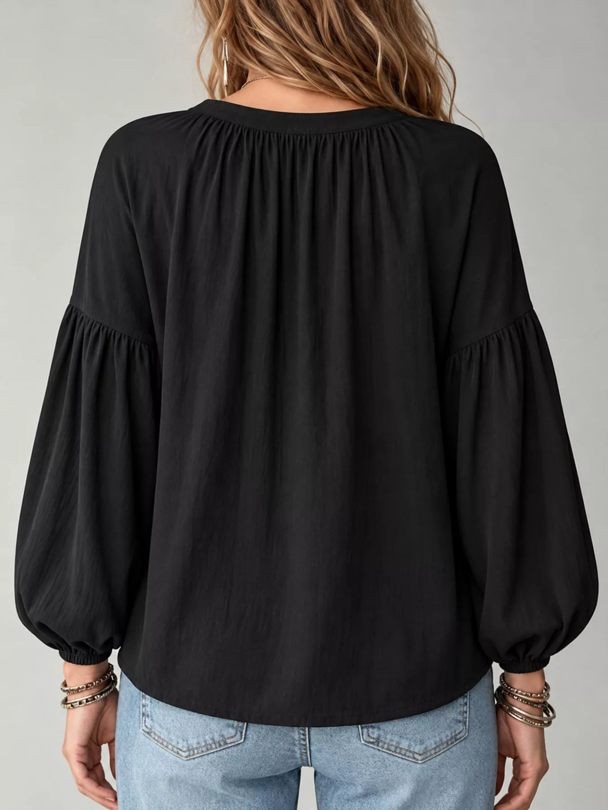 Notched Balloon Sleeve Blouse in black, back view