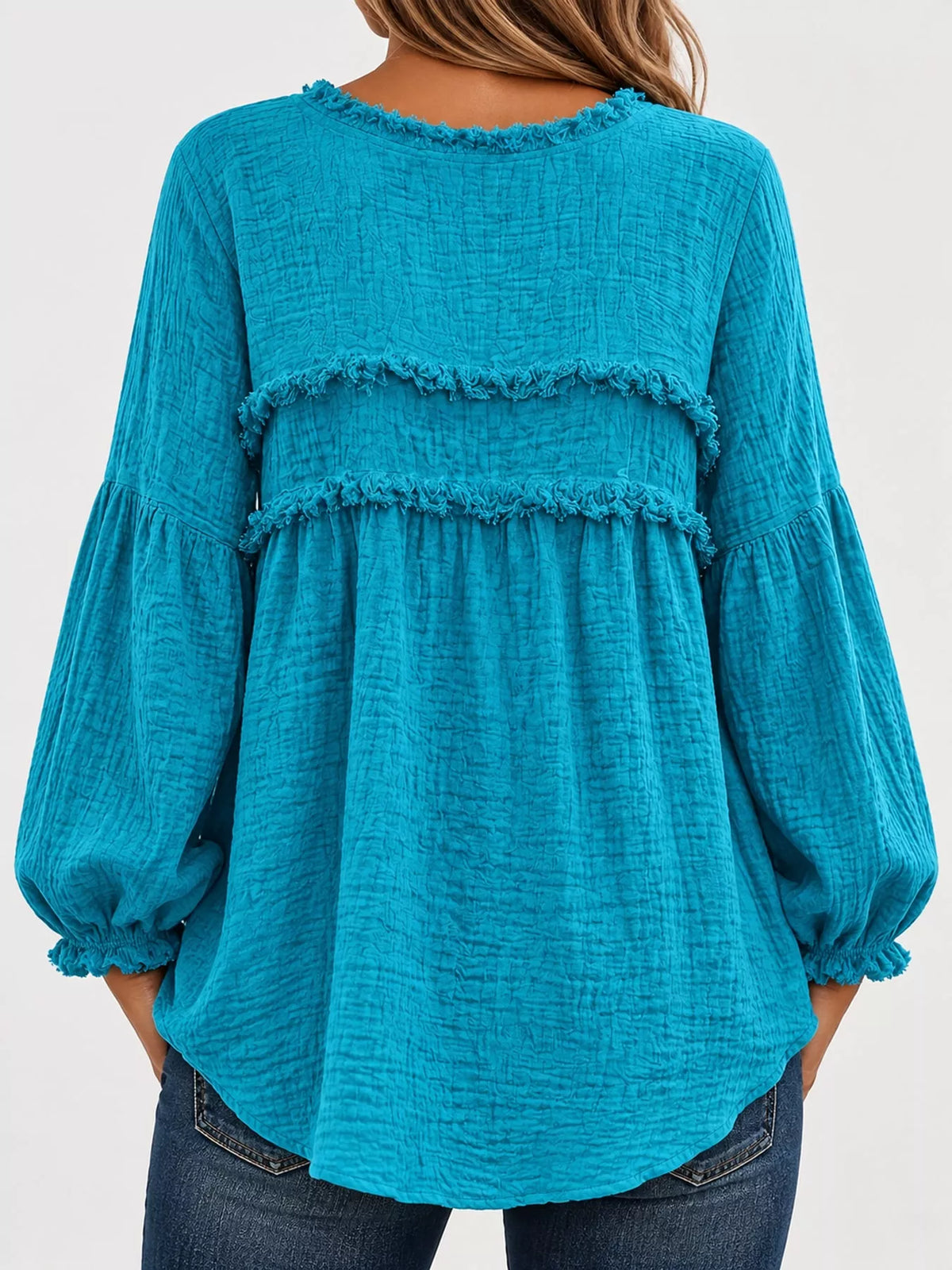 Teal textured frayed-trim peplum blouse, back view