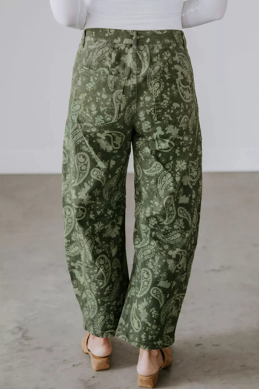 Green paisley print harem denim pants, back view