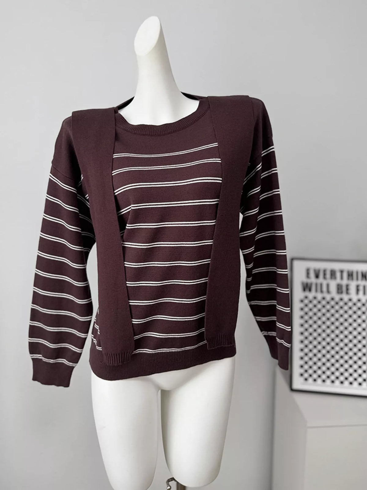 Striped crewneck sweater with layered tie detail in brown, front mannequin view with loose ties