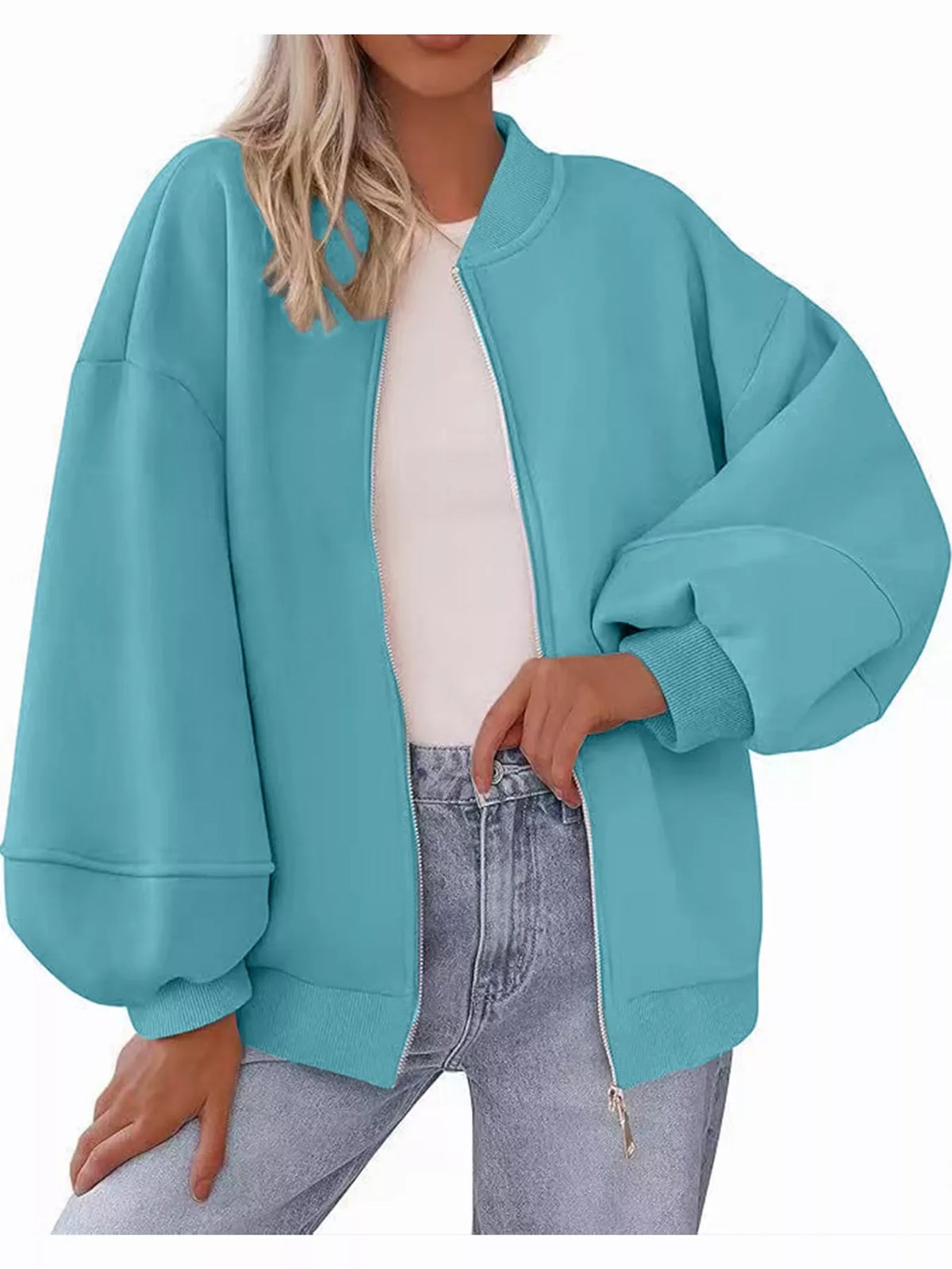 Turquoise oversized zip-up jacket — front view