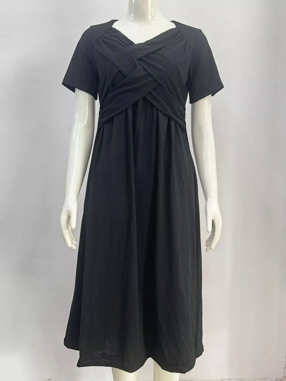 Black crisscross short sleeve midi dress, front view