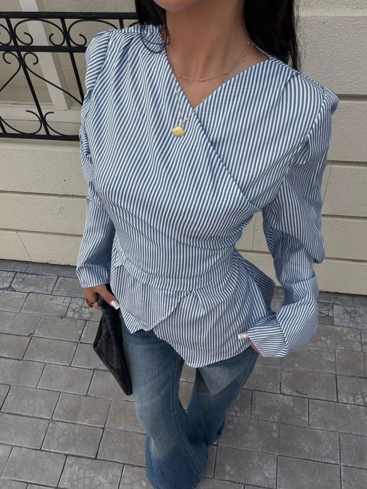 V-neck long sleeve blouse, front view on model