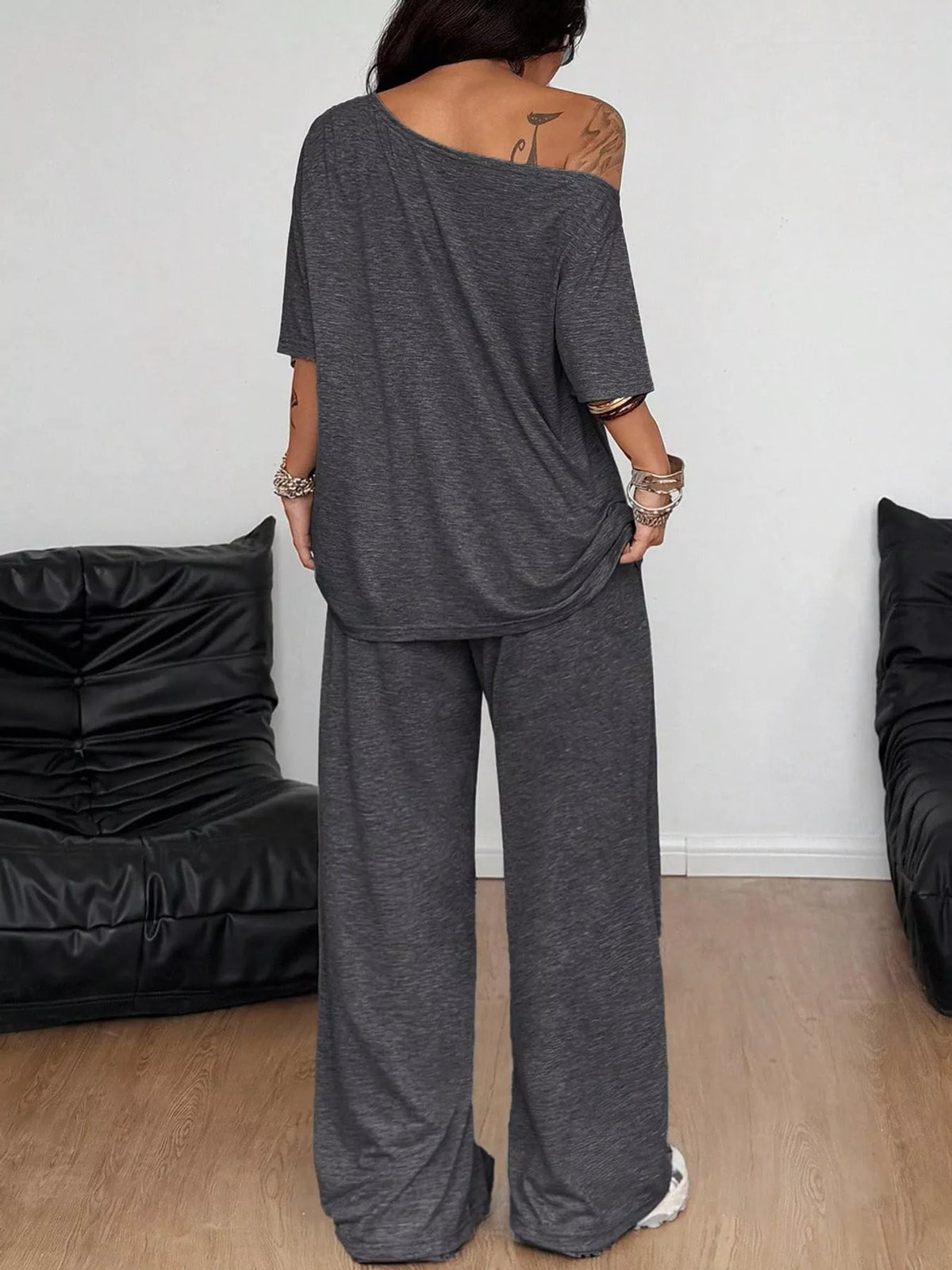 Dark gray boat neck top and wide-leg pants set — back view