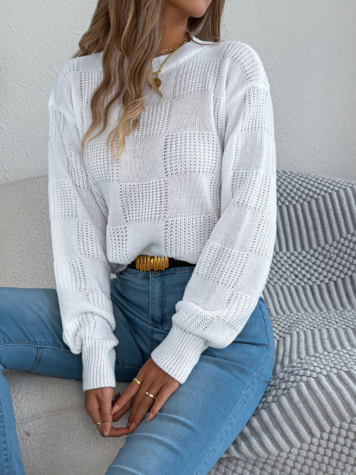 Gray checkerboard textured knit sweater