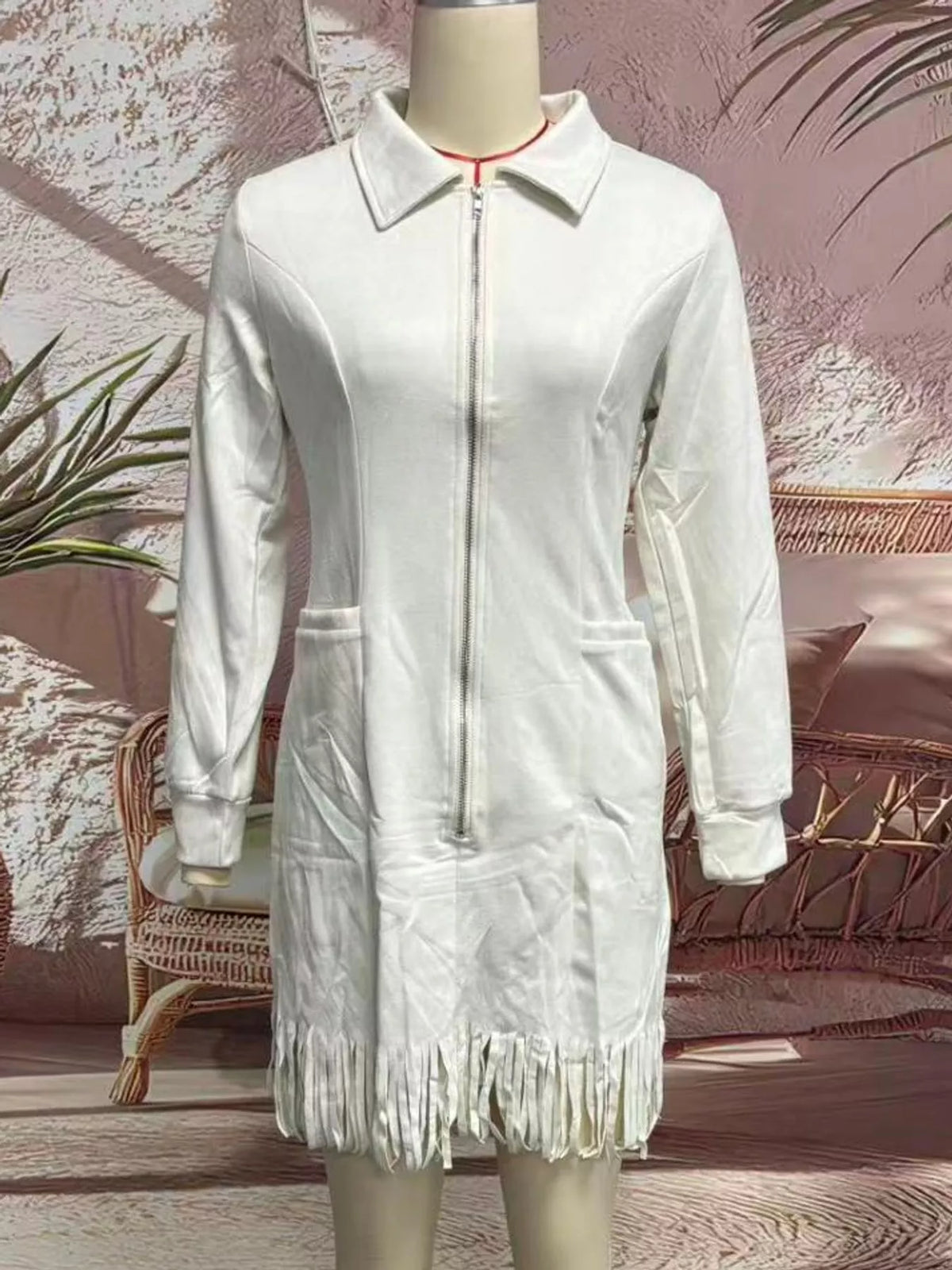 White zip front long sleeve fringe mini dress, front view