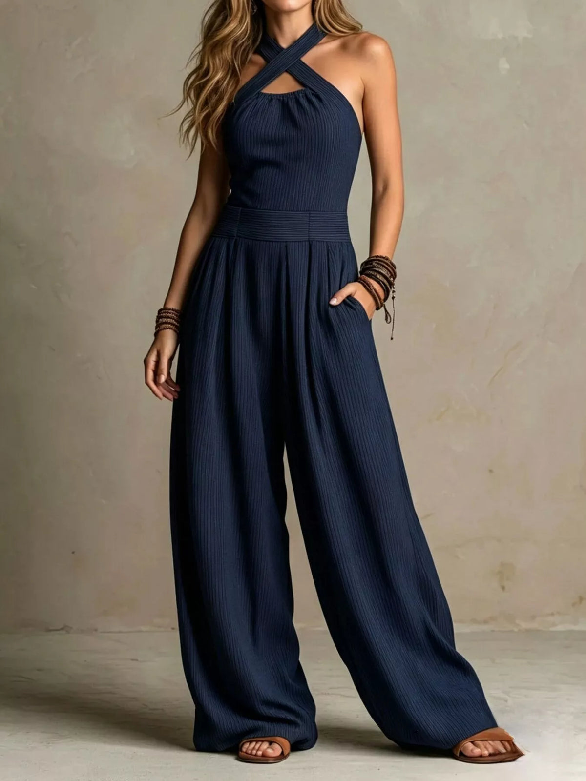 Navy halter-neck wide-leg jumpsuit, front view