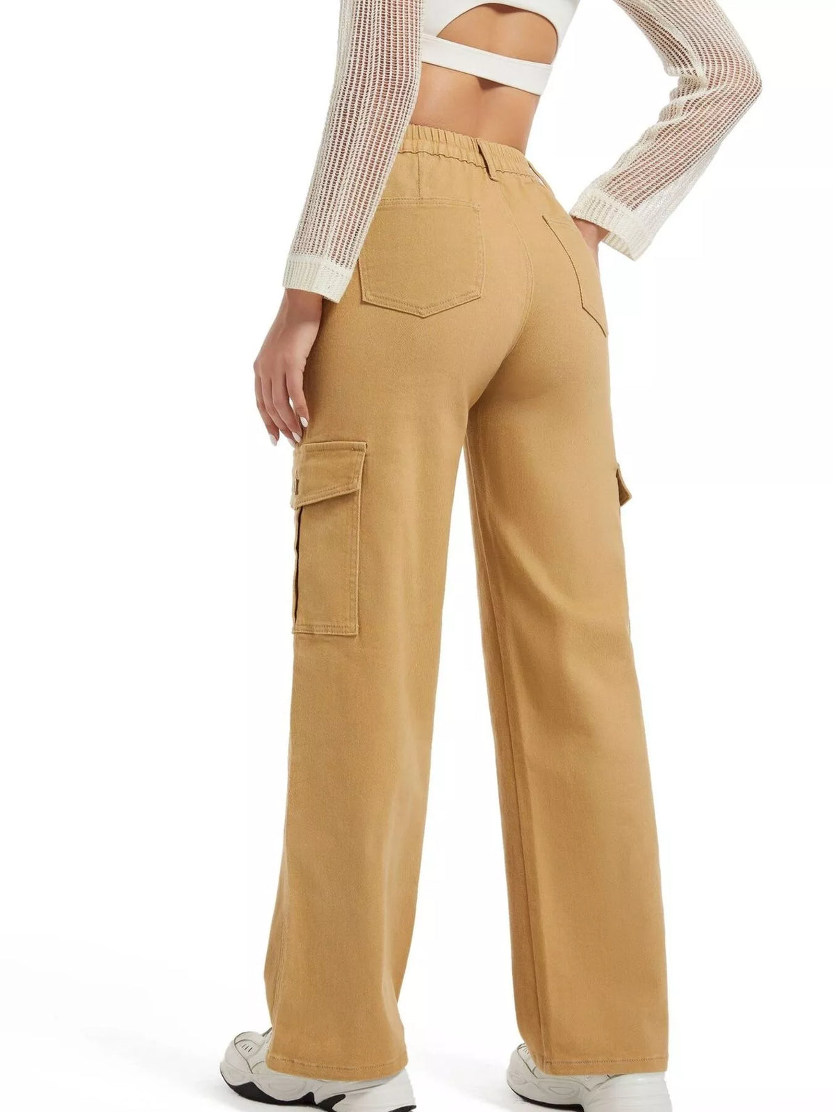Tan wide-leg cargo jeans, side view with hand at hip