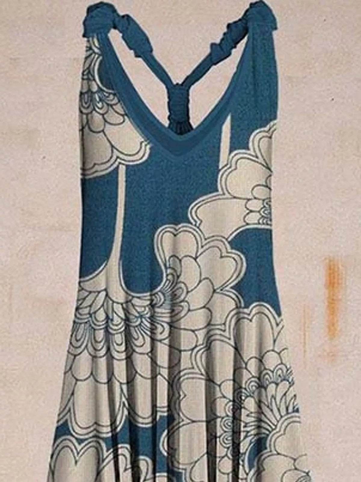 Blue and cream floral-print V-neck sleeveless jumpsuit, neckline and strap detail