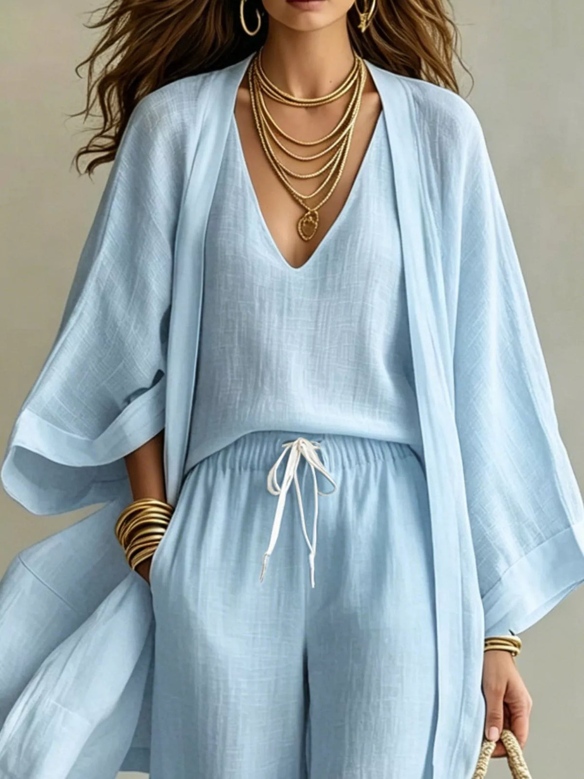 V-Neck Top, Cardigan and Pants Three-Piece Set in light blue, front view