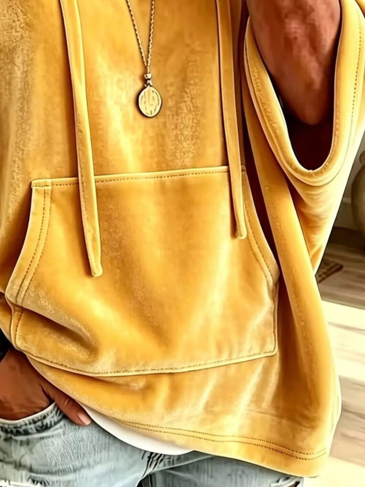 Yellow velvet kangaroo pocket drawstring hoodie, detail view