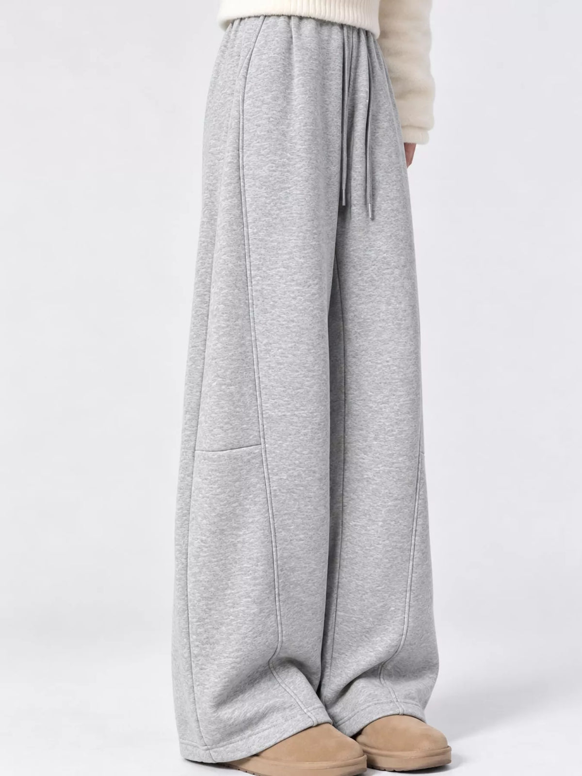 Gray wide leg drawstring sweatpants, side view