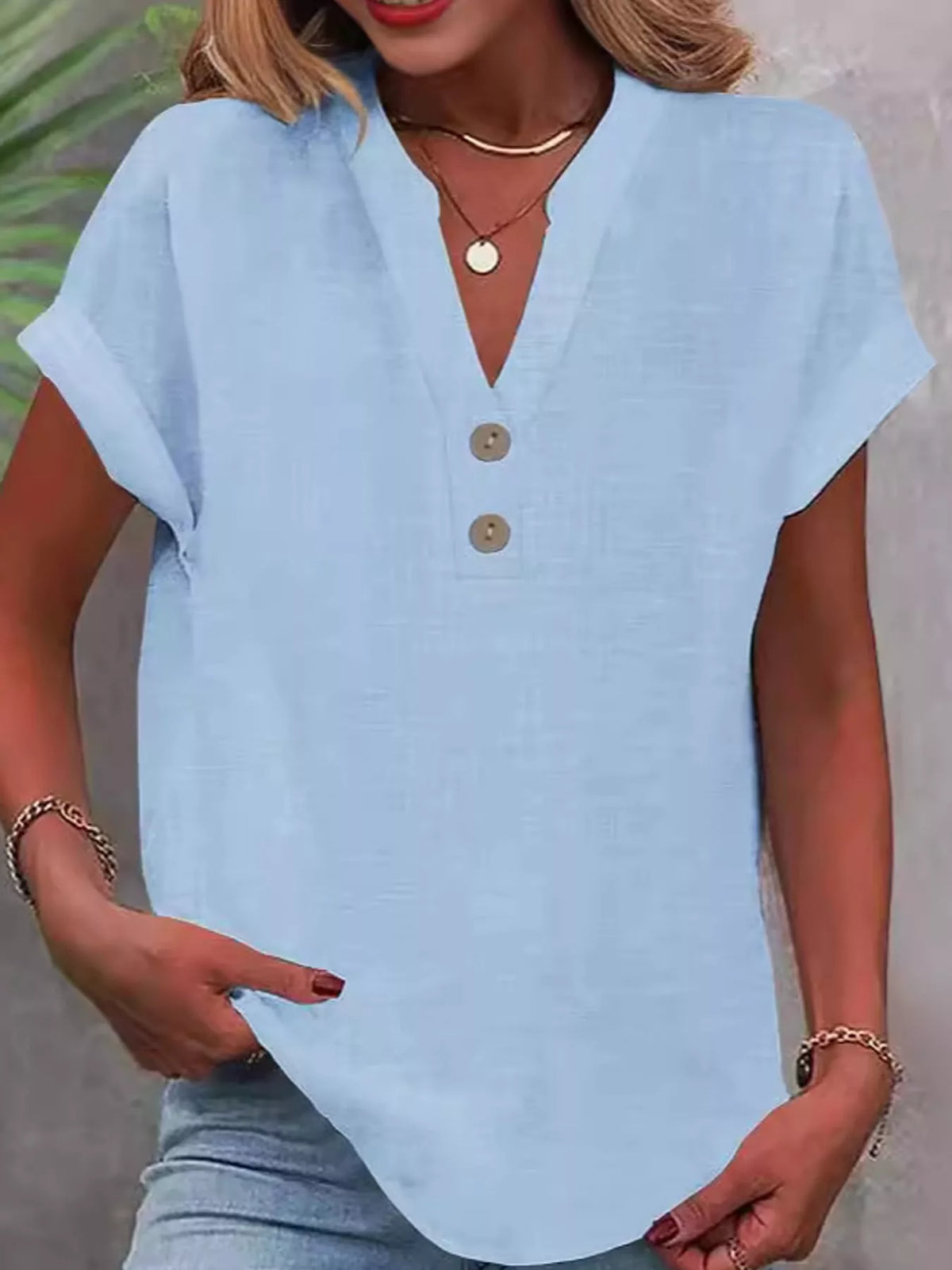 Light blue button detail short sleeve blouse, front view