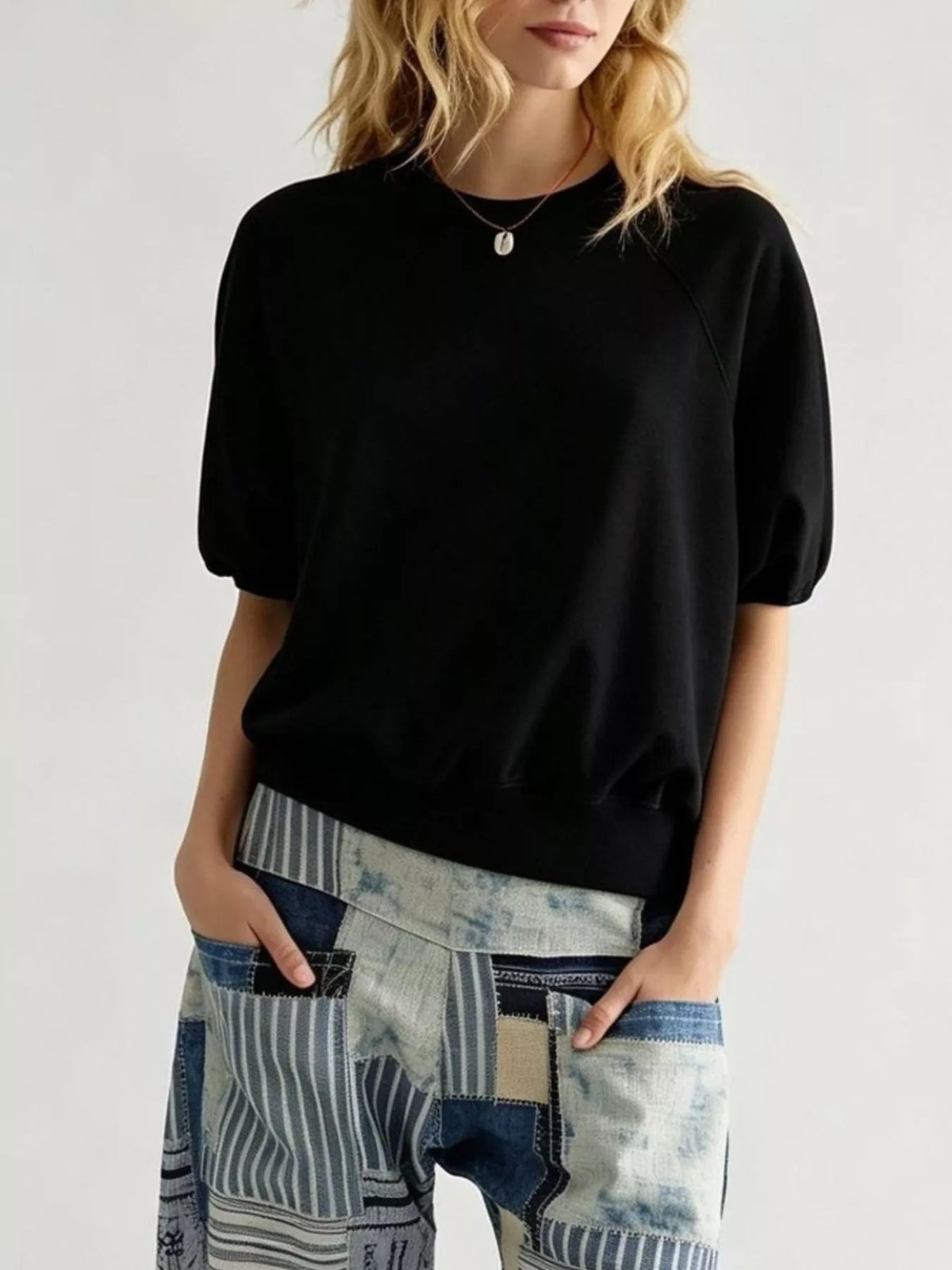 Women's Raglan Short-Sleeve Sweatshirt in black — front view