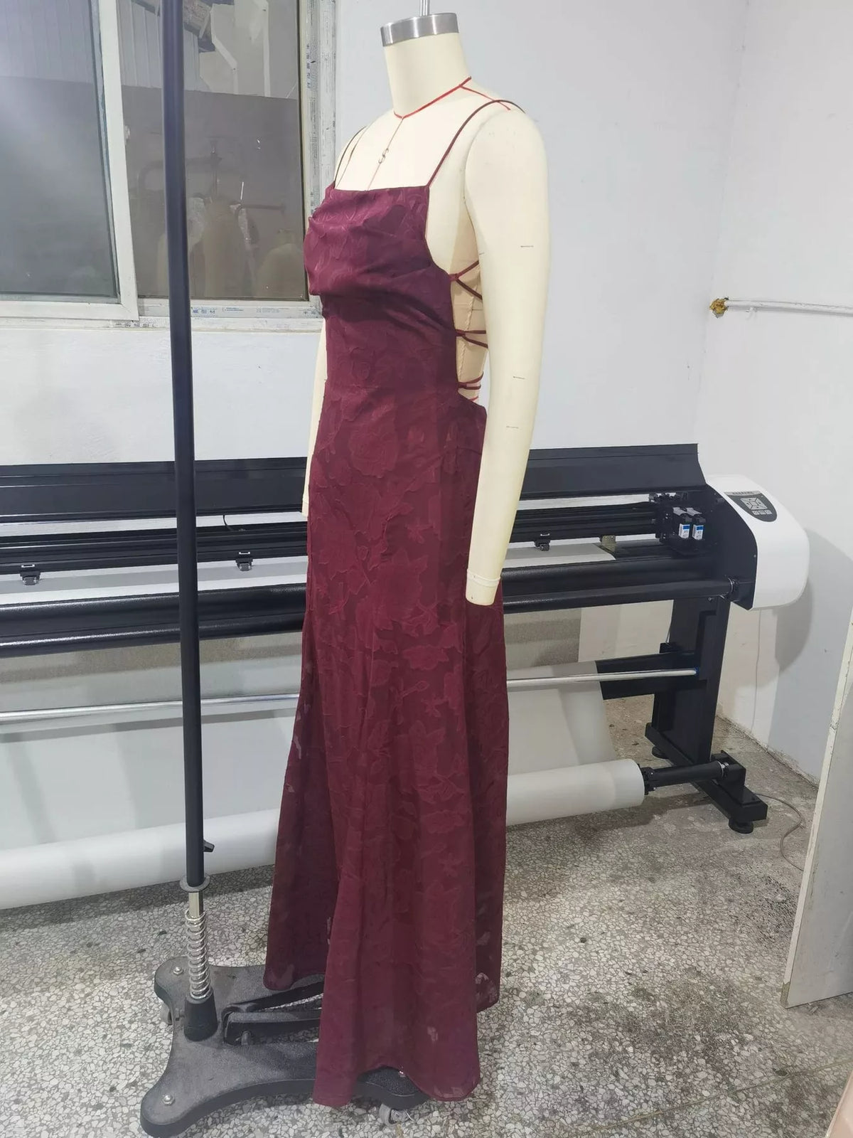 Burgundy backless lace maxi dress, side view