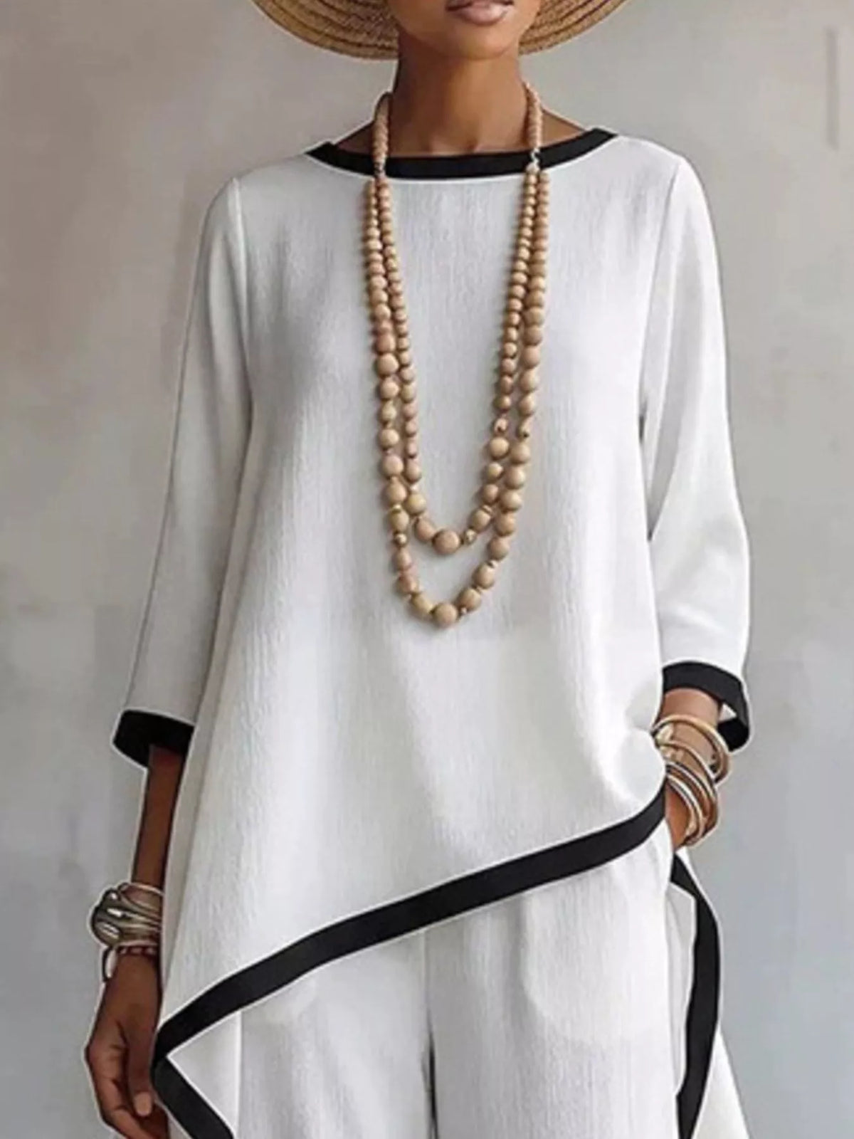 White contrast-trim top and pants set, asymmetric top detail
