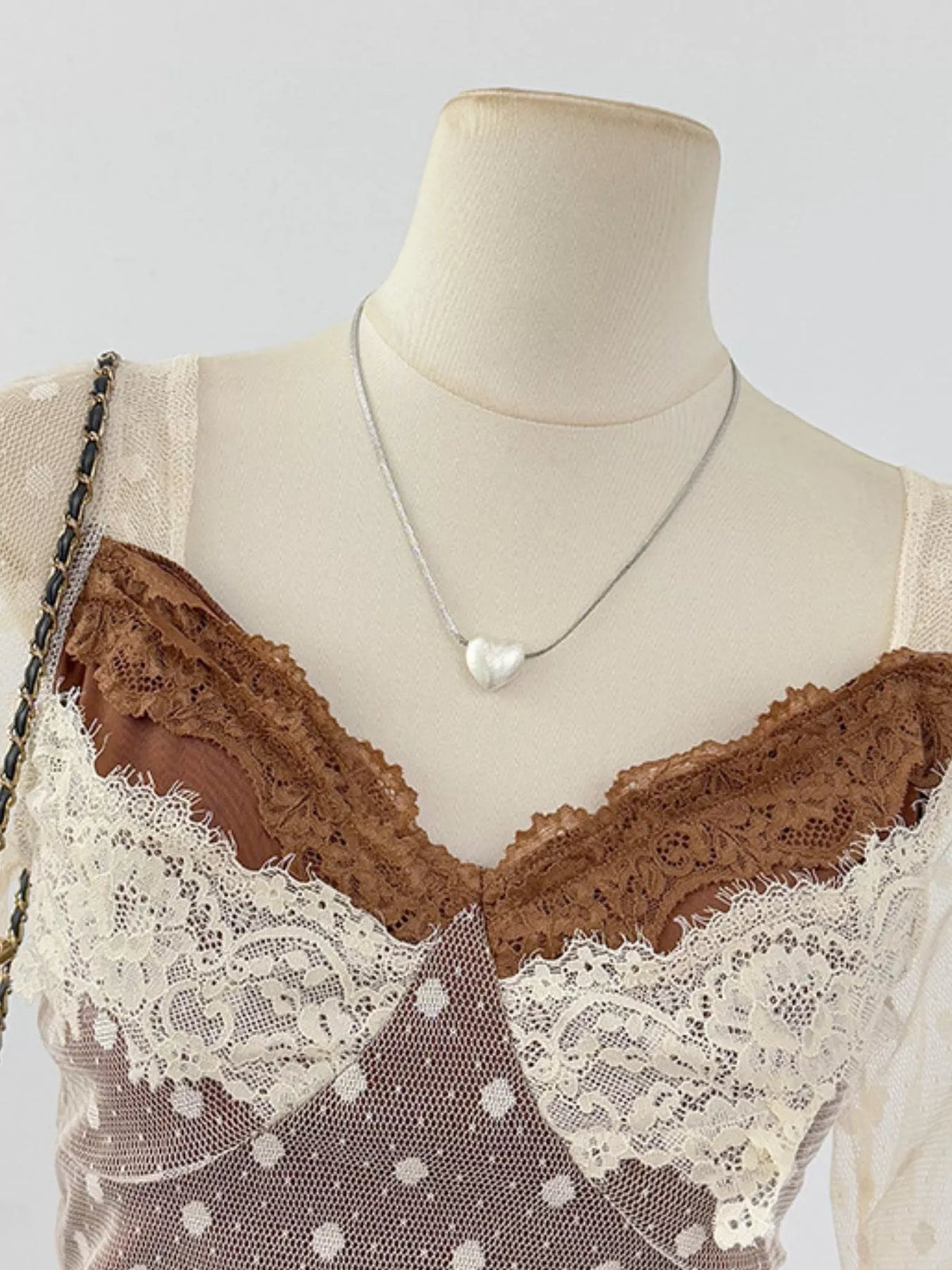 Vintage Lace Contrast Blouse with Polka Dot Mesh Sleeves, detail view in brown and cream