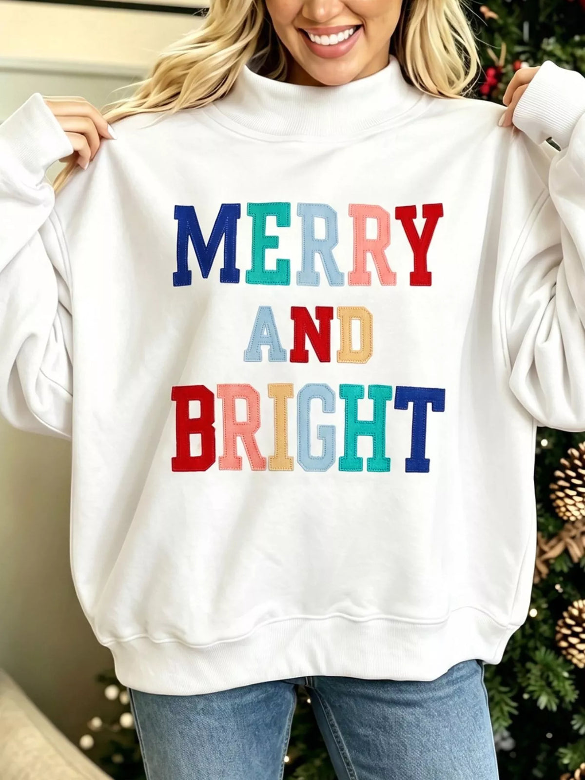 MERRY AND BRIGHT sweatshirt, white front held out