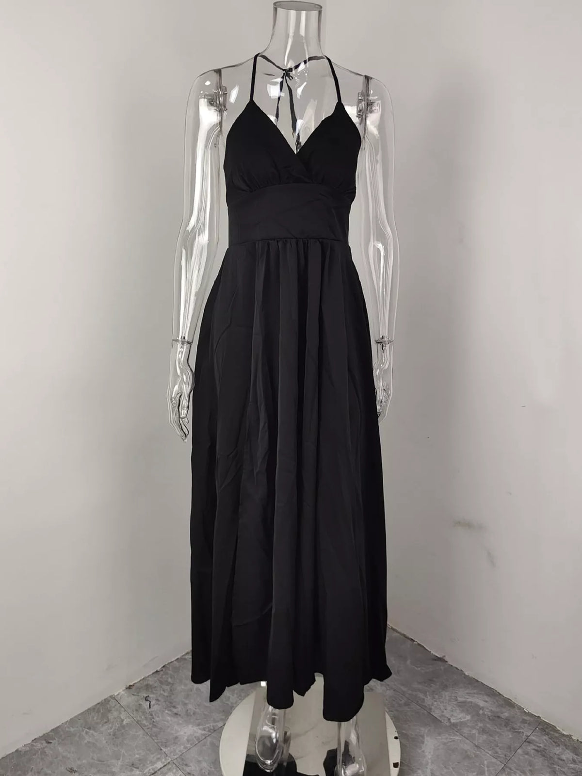 Black sleeveless high slit maxi dress, front view