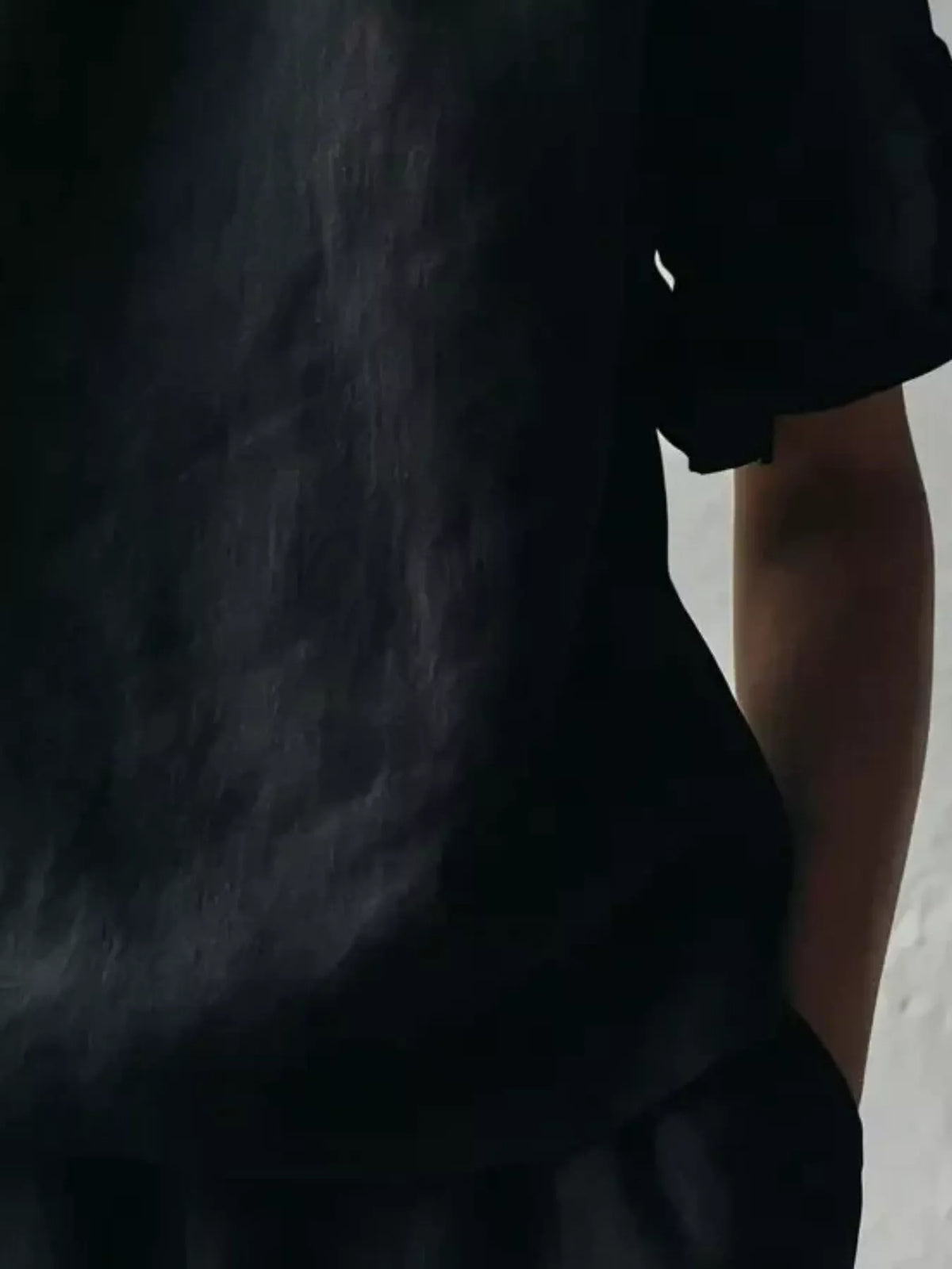 Black Ruffle-Neck Short Sleeve Blouse, hem detail