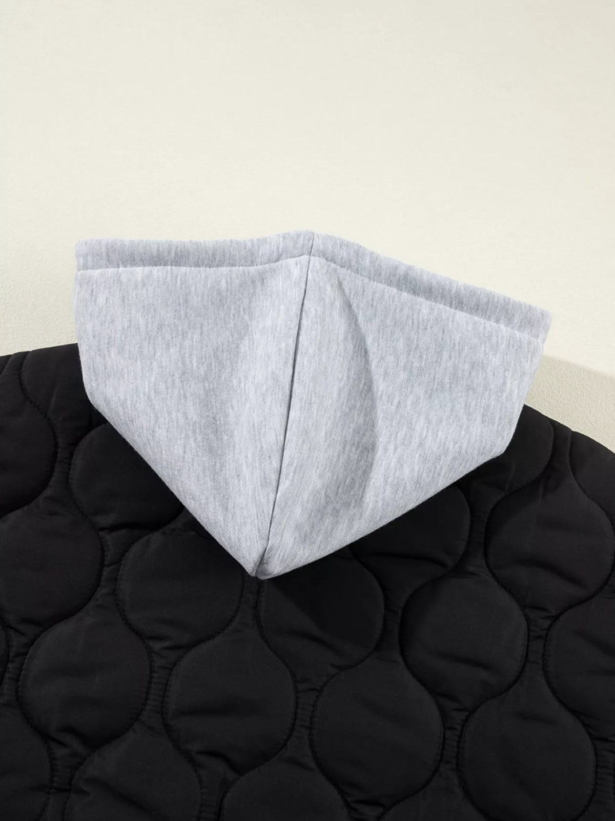 Hooded puffer vest, gray hood back
