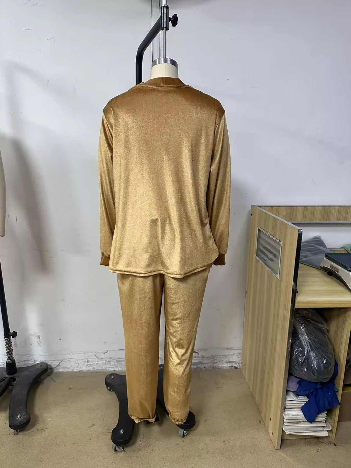 Gold velvet cowl neck top and pants set, back on mannequin