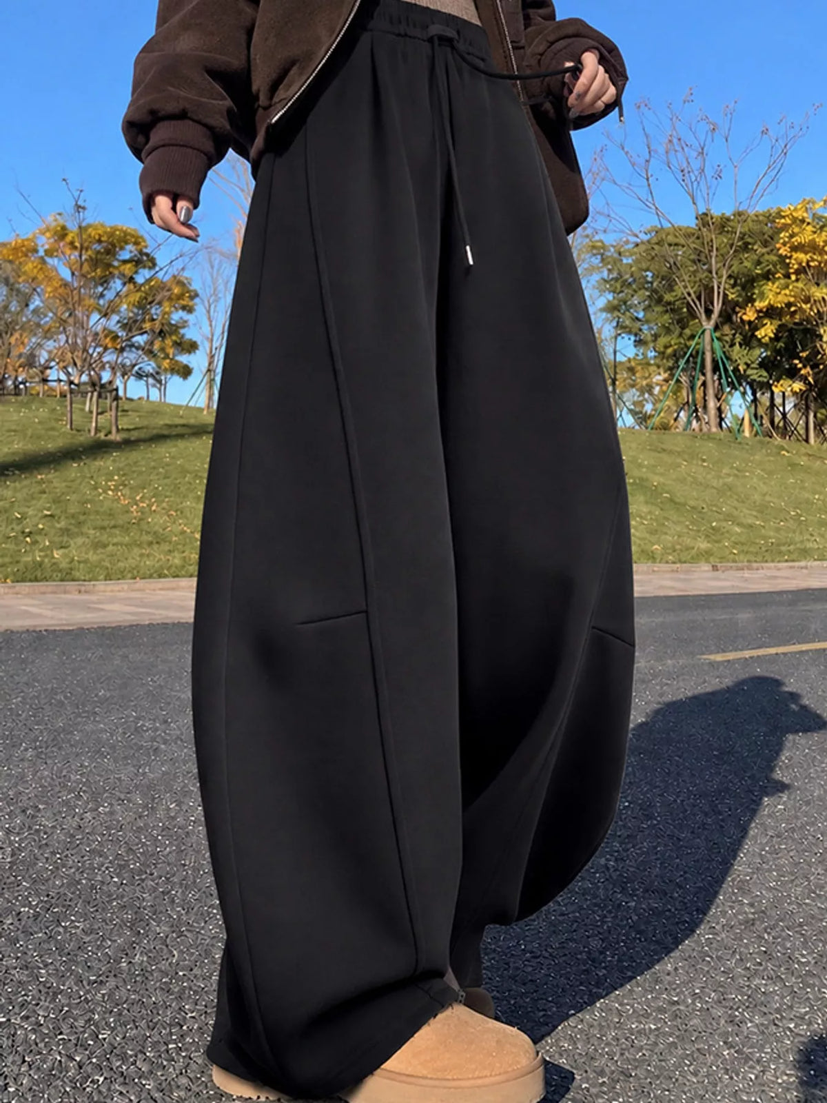 Black wide leg drawstring sweatpants, front view