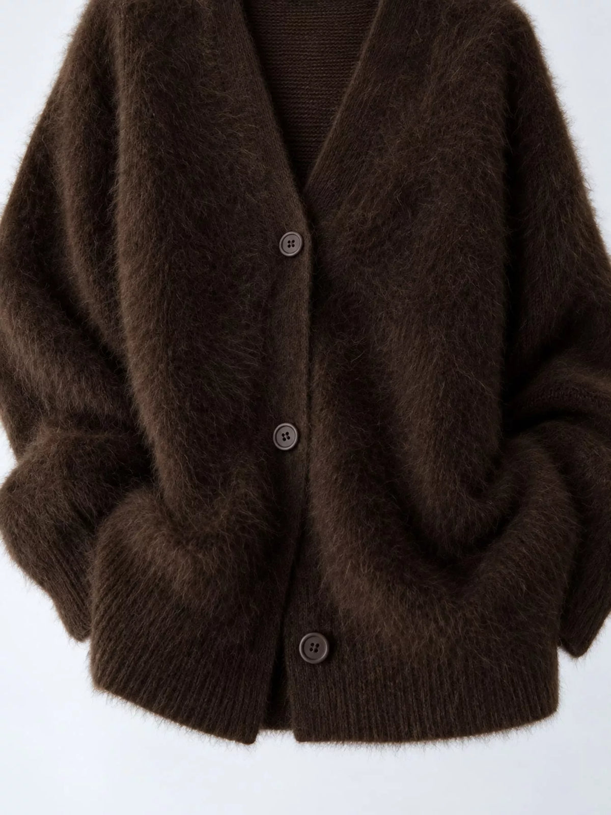 Brown fuzzy v-neck button-down cardigan, flat front view showing neckline, buttons, and fuzzy knit hem