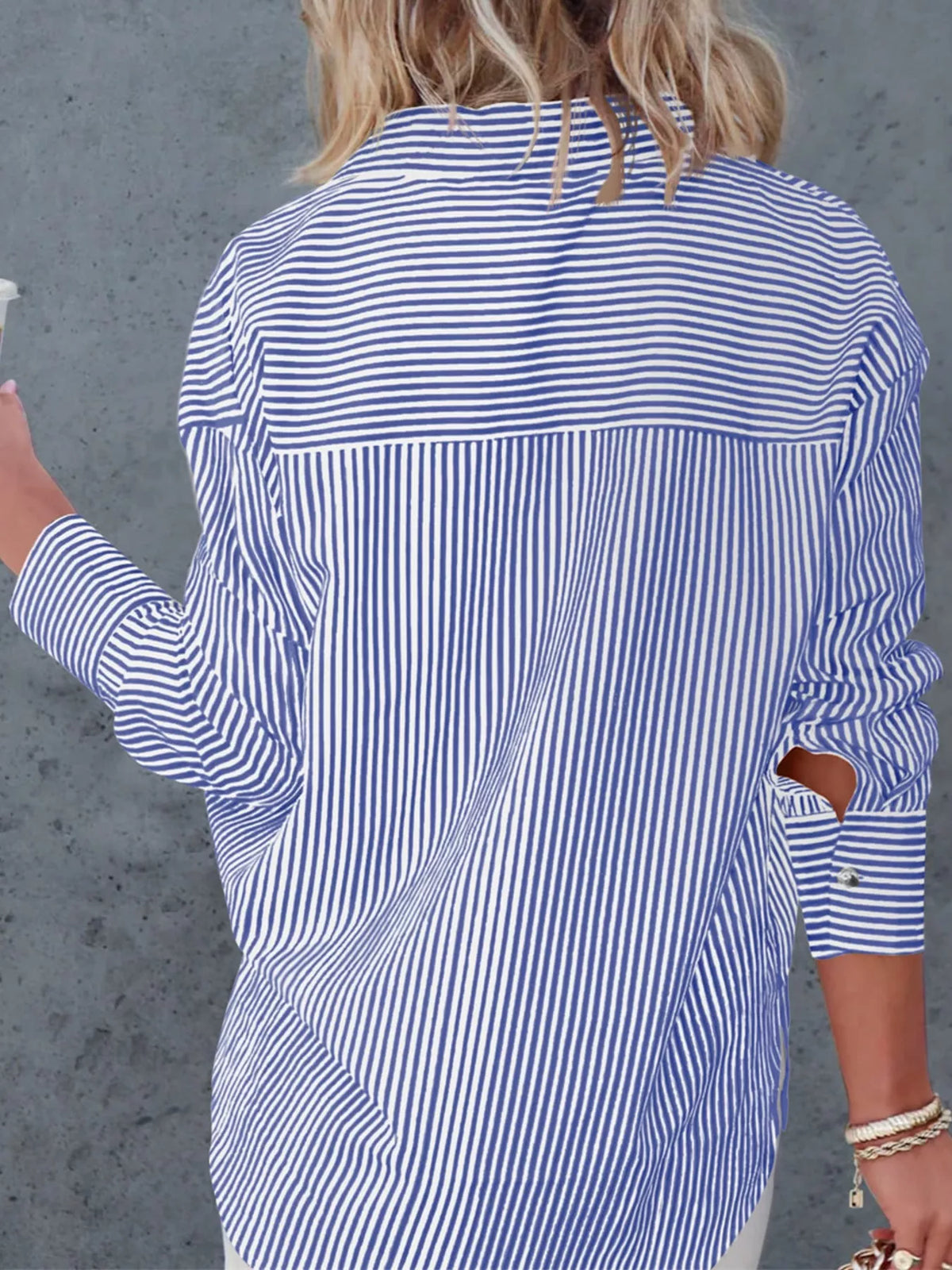 Blue striped button-down shirt, back view