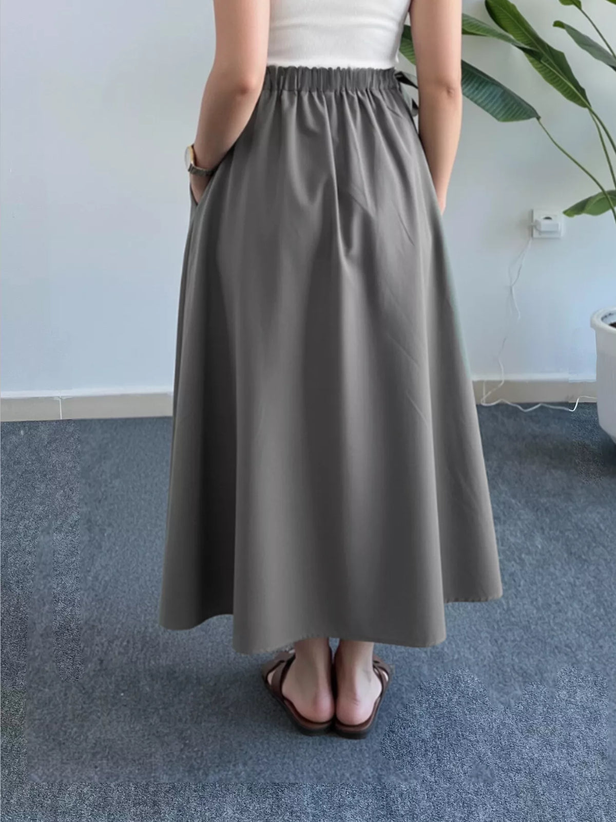 Trendsi Flowy A-Line Midi Skirt with Pockets -