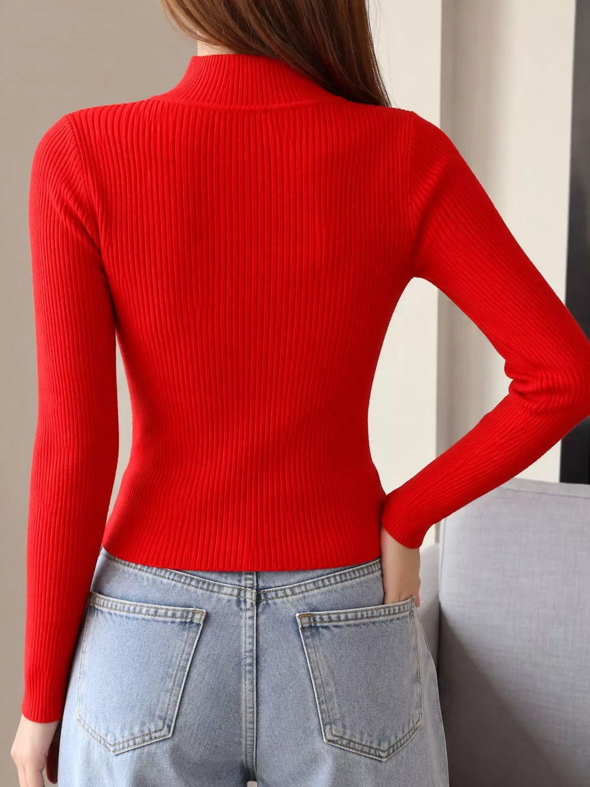 Red ribbed mock neck long sleeve knit top, back view