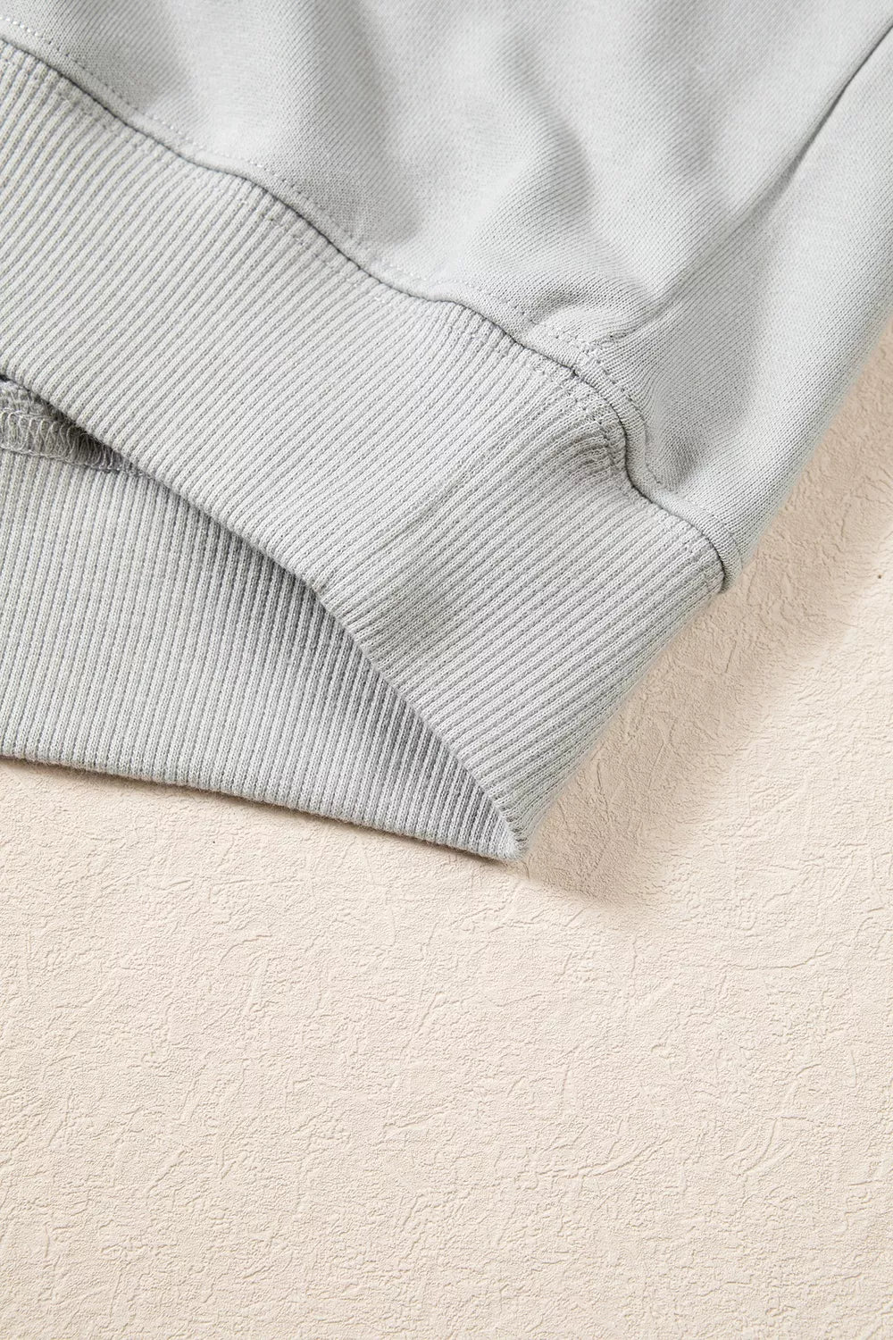 Gray floral and plaid PRAY patch sweatshirt, ribbed hem