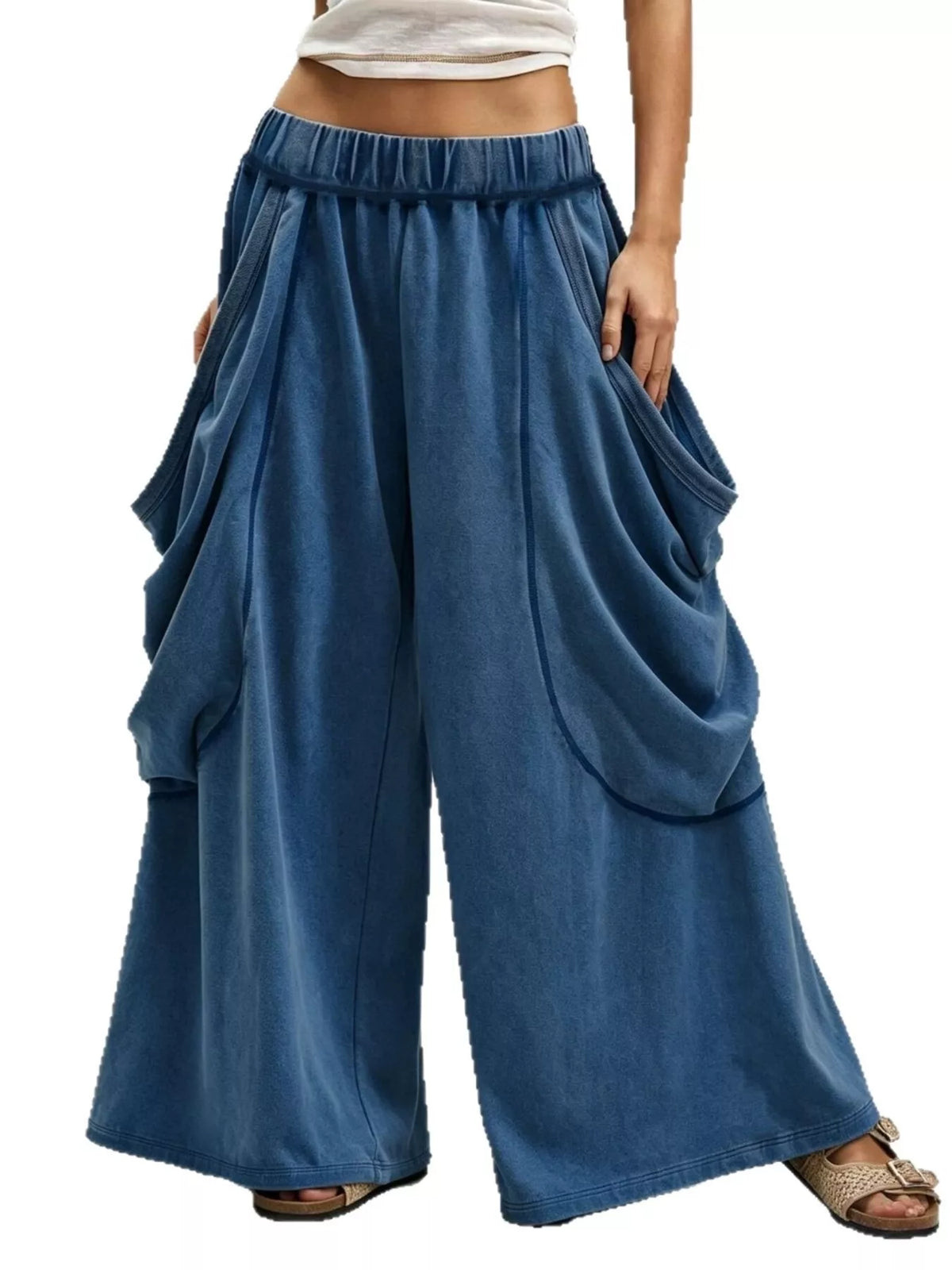 Blue wide-leg cargo pants, front view holding side pockets