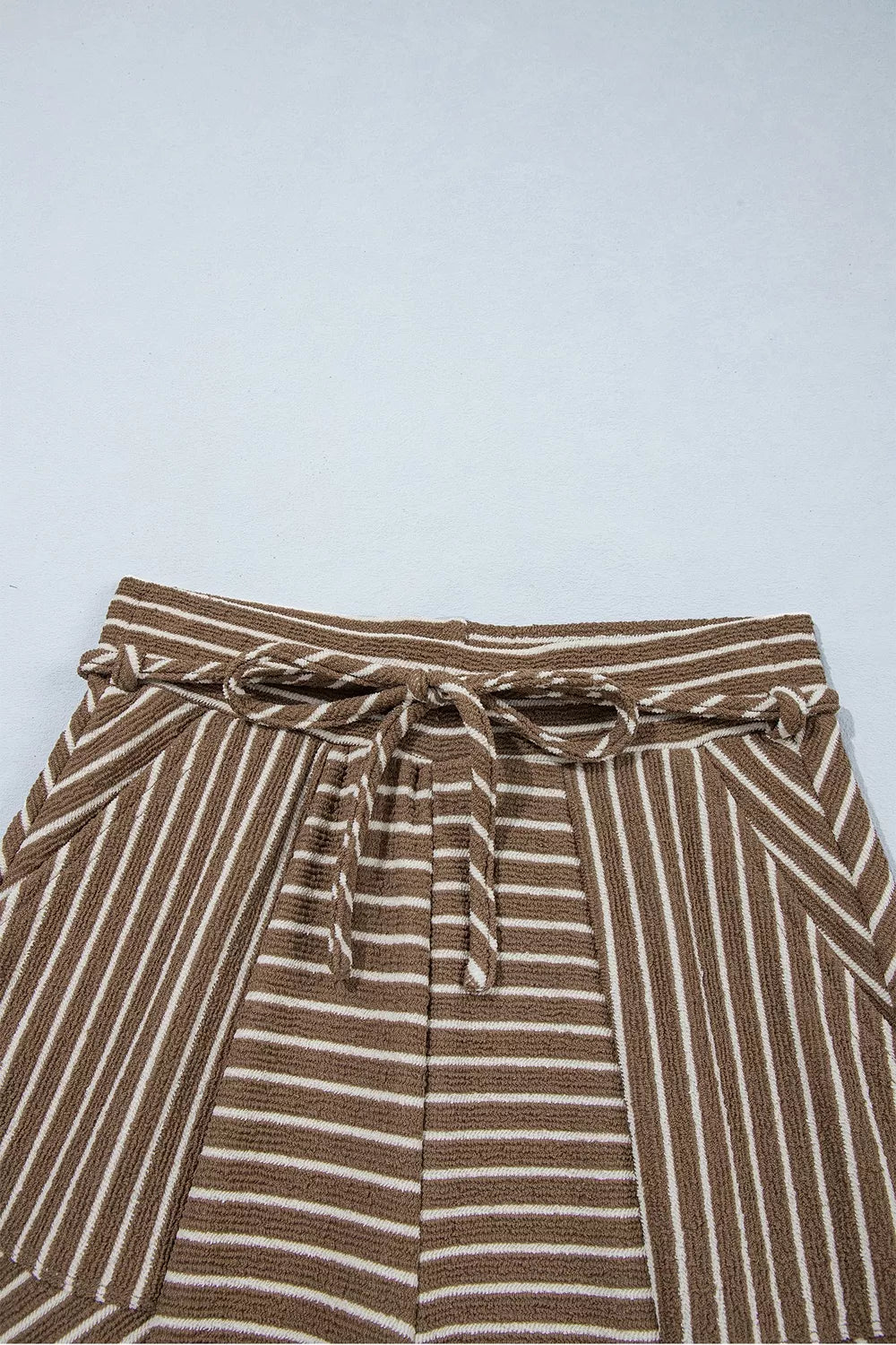 Brown striped wide-leg drawstring pants, waist detail