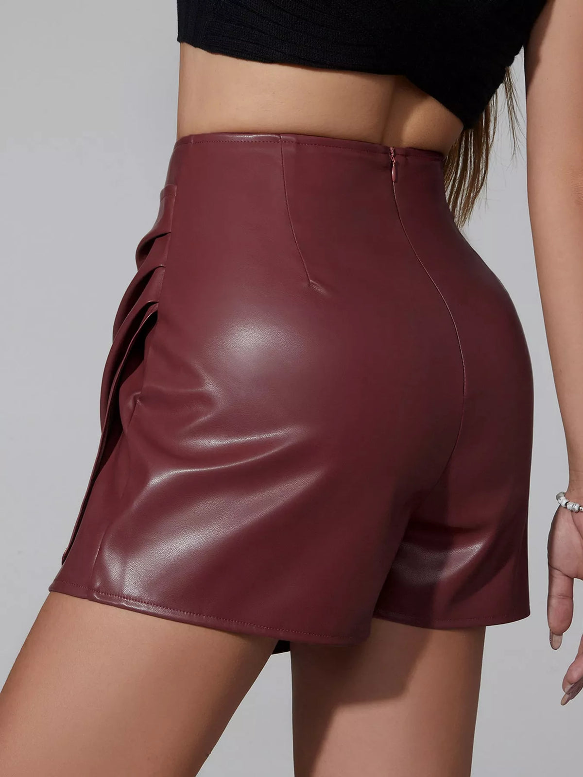 High-Waisted Ruched Faux Leather Skort — back view