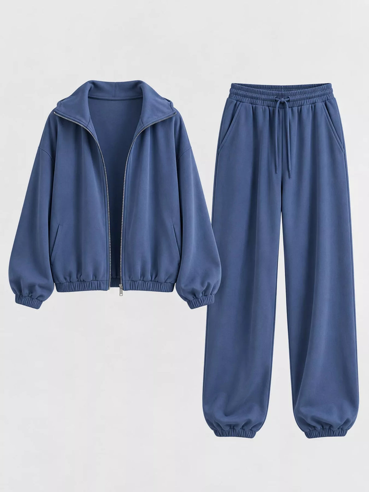 Blue zip-up outerwear and pants set — front view